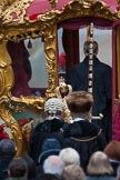 Lord Mayor's Show 2012: The Chaplin, the Sergeant of Arms, and the Sword Bearer, getting into the State Coach..
Press stand opposite Mansion House, City of London,
London,
Greater London,
United Kingdom,
on 10 November 2012 at 12:11, image #1934