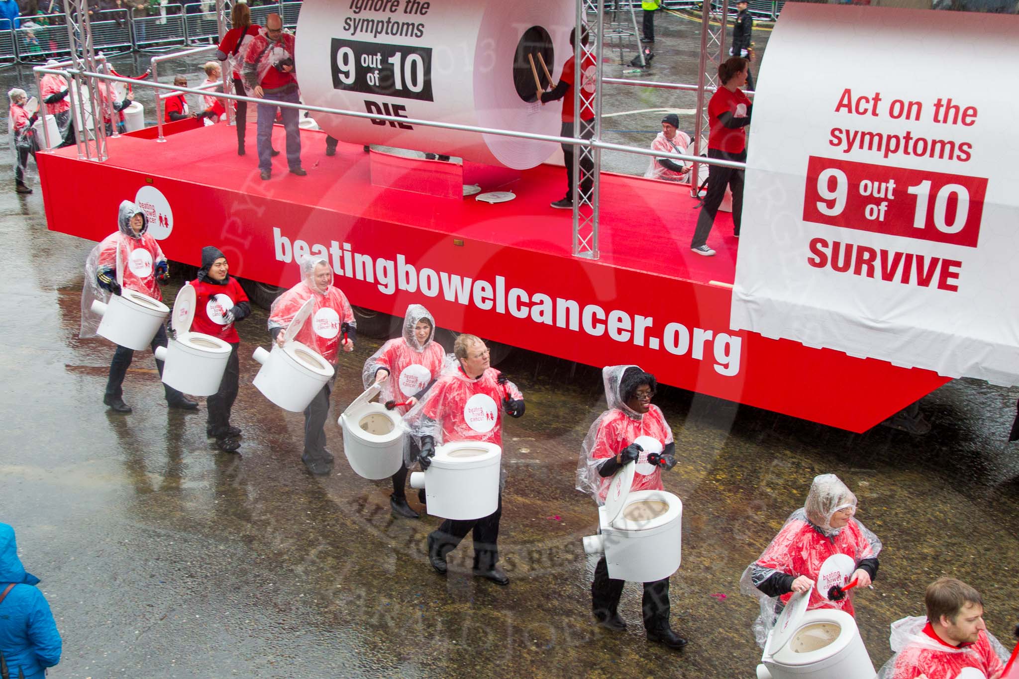 Lord Mayor's Show 2013: 50-Beating Bowel Cancer-are here to raise awareness and promote early diagnosis..
Press stand opposite Mansion House, City of London,
London,
Greater London,
United Kingdom,
on 09 November 2013 at 11:28, image #663