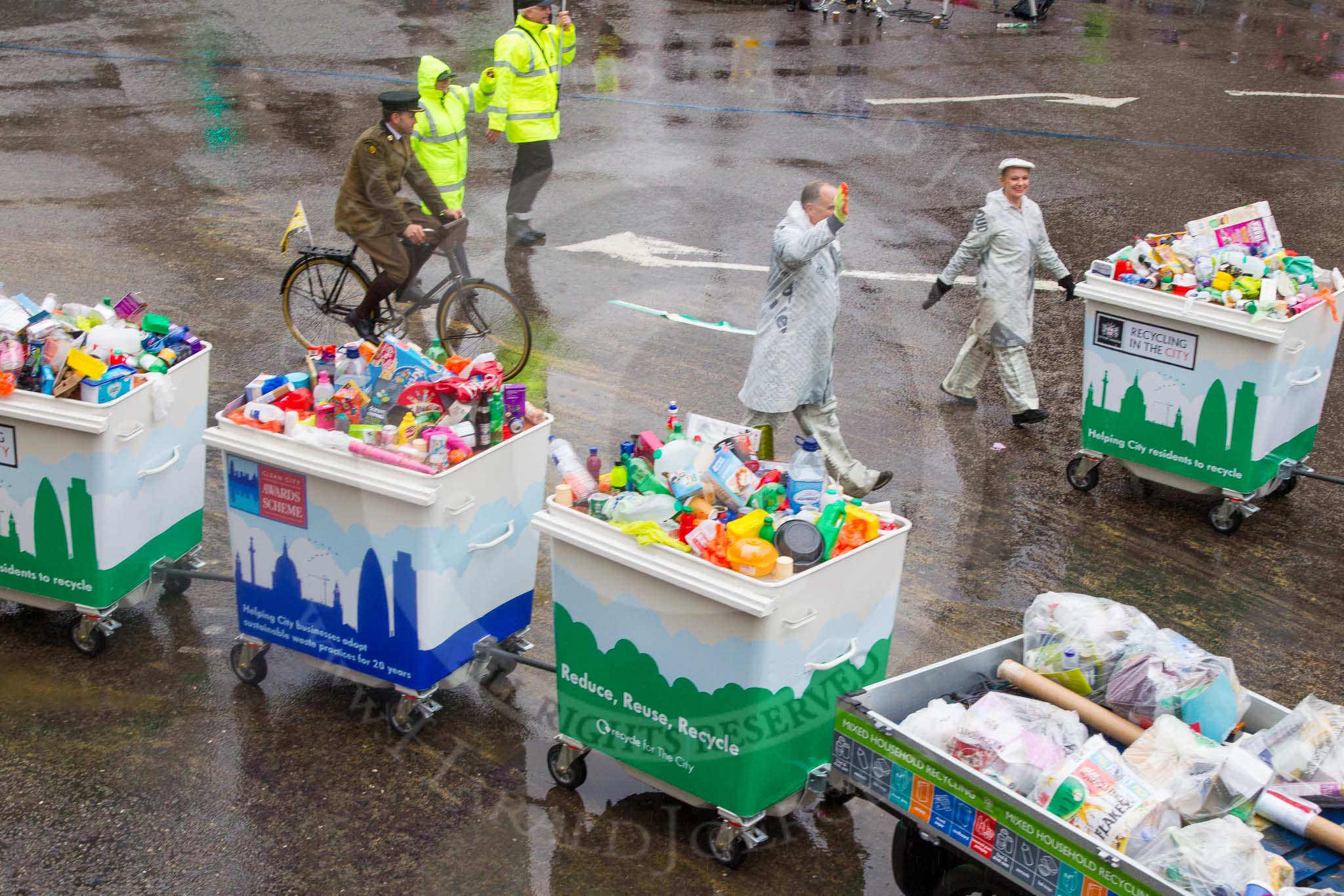 Lord Mayor's Show 2013: 59-Recycling in the City- The Binbot is joined again by his drumming street sweepers to celebrate 20th anniversary of the City's unique Clean City Awards scheme..
Press stand opposite Mansion House, City of London,
London,
Greater London,
United Kingdom,
on 09 November 2013 at 11:32, image #754