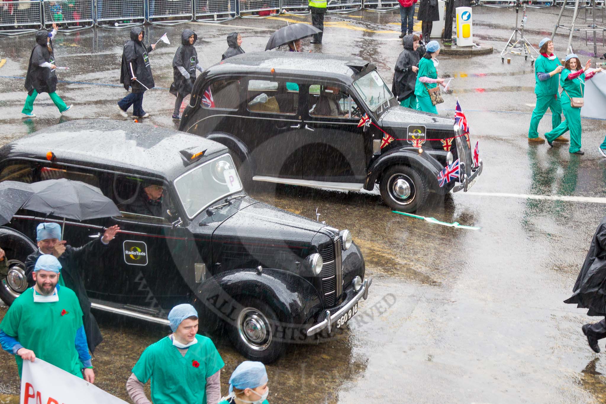 Lord Mayor's Show 2013: 69-Radio Taxis Group-today's entry celebrates 60 years of taxi history and supports the Papworth Heart Hospital..
Press stand opposite Mansion House, City of London,
London,
Greater London,
United Kingdom,
on 09 November 2013 at 11:37, image #839