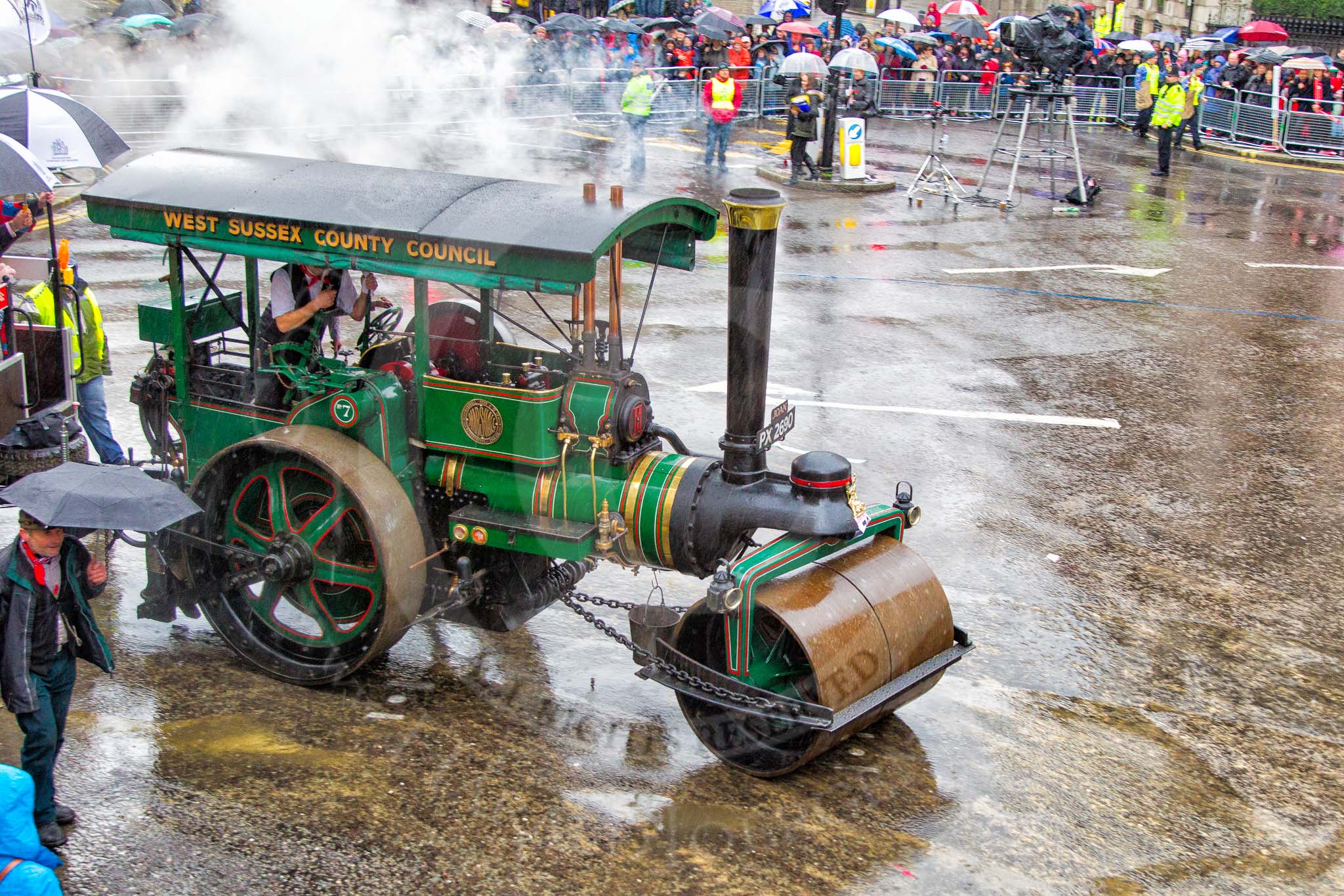 Lord Mayor's Show 2013: 70-Worshipful Company of Paviors-which brings together construction-industry professionals involved with roads and pavements.This year's float features the 'pig' that mediaeval paviors would have cleared from city streets and it towed by a steamroller from Amberley museum..
Press stand opposite Mansion House, City of London,
London,
Greater London,
United Kingdom,
on 09 November 2013 at 11:39, image #847