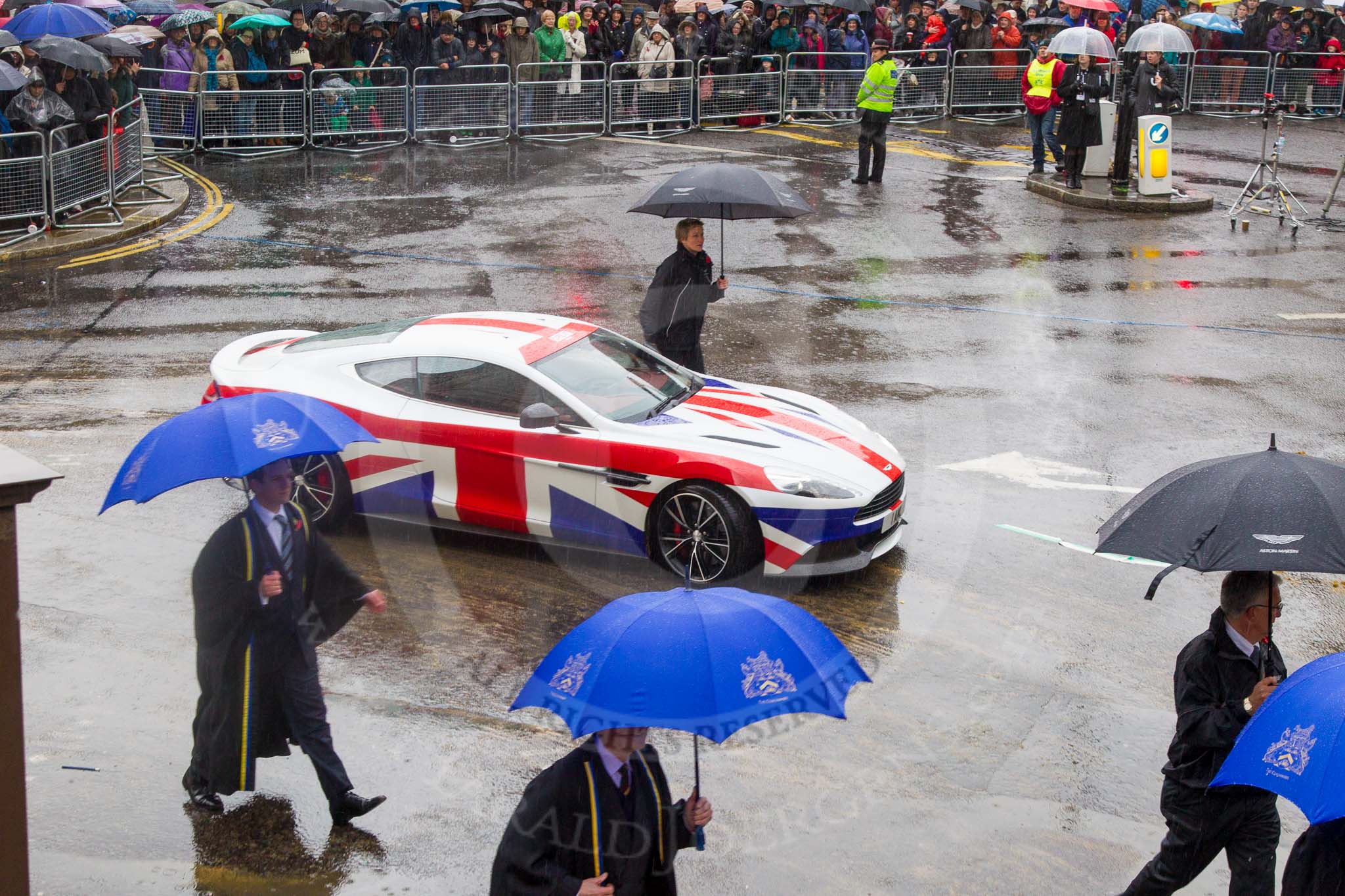 Lord Mayor's Show 2013: 78-Aston Martin Lagonda representing the Coachmakers- reflecting its modern association with the motor industry, the Company of Coachmakers and Coach Harness Makers is collaborating with Aston Martin, which this year celebrate 100 years of 'power, beauty and soul'..
Press stand opposite Mansion House, City of London,
London,
Greater London,
United Kingdom,
on 09 November 2013 at 11:43, image #940