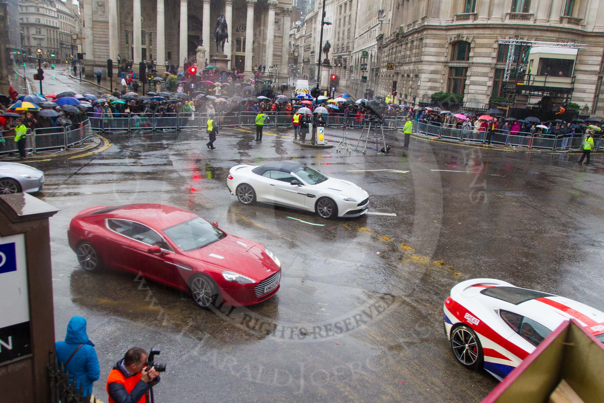 Lord Mayor's Show 2013: 78-Aston Martin Lagonda representing the Coachmakers- reflecting its modern association with the motor industry, the Company of Coachmakers and Coach Harness Makers is collaborating with Aston Martin, which this year celebrate 100 years of 'power, beauty and soul'..
Press stand opposite Mansion House, City of London,
London,
Greater London,
United Kingdom,
on 09 November 2013 at 11:43, image #944