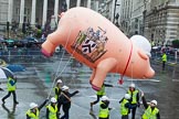 Lord Mayor's Show 2013: 70-Worshipful Company of Paviors-which brings together construction-industry professionals involved with roads and pavements.This year's float features the 'pig' that mediaeval paviors would have cleared from city streets and it towed by a steamroller from Amberley museum..
Press stand opposite Mansion House, City of London,
London,
Greater London,
United Kingdom,
on 09 November 2013 at 11:39, image #857
