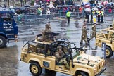 Lord Mayor's Show 2013: 73-The Royal Yeomanry- is London's only Army Reserve Calvary unit.  It use some of the armoured vehicles that you will see in the Show today..
Press stand opposite Mansion House, City of London,
London,
Greater London,
United Kingdom,
on 09 November 2013 at 11:40, image #880