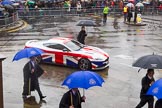 Lord Mayor's Show 2013: 78-Aston Martin Lagonda representing the Coachmakers- reflecting its modern association with the motor industry, the Company of Coachmakers and Coach Harness Makers is collaborating with Aston Martin, which this year celebrate 100 years of 'power, beauty and soul'..
Press stand opposite Mansion House, City of London,
London,
Greater London,
United Kingdom,
on 09 November 2013 at 11:43, image #940