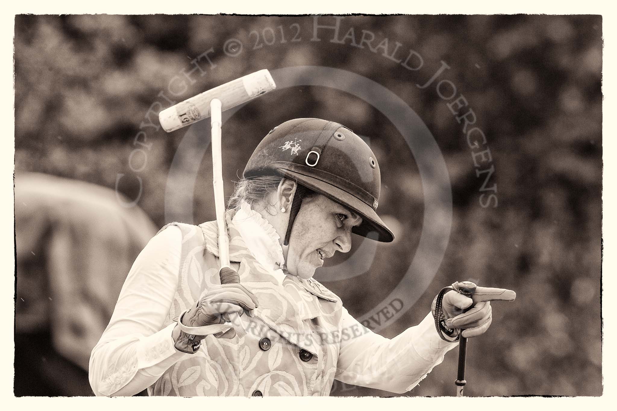 7th Heritage Polo Cup semi-finals: The Amzons of Polo sponsored by Polistas 
Barbara P Zingg pointing at her Pony for the next chukker..
Hurtwood Park Polo Club,
Ewhurst Green,
Surrey,
United Kingdom,
on 04 August 2012 at 13:21, image #131