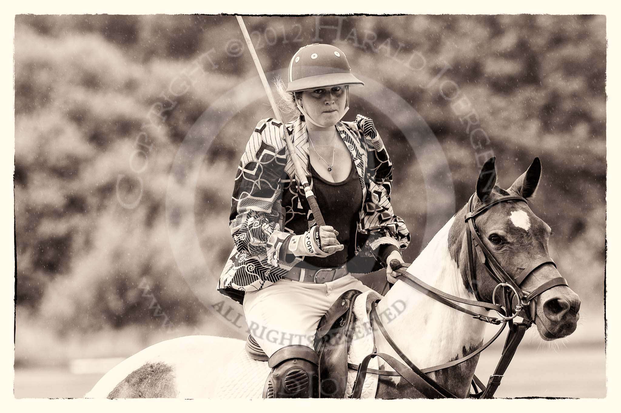 7th Heritage Polo Cup semi-finals: Sophie Kyriazy wearing Nigerian Fashion Design DZNY sponsored by AMG PETROENERGY..
Hurtwood Park Polo Club,
Ewhurst Green,
Surrey,
United Kingdom,
on 04 August 2012 at 13:36, image #163