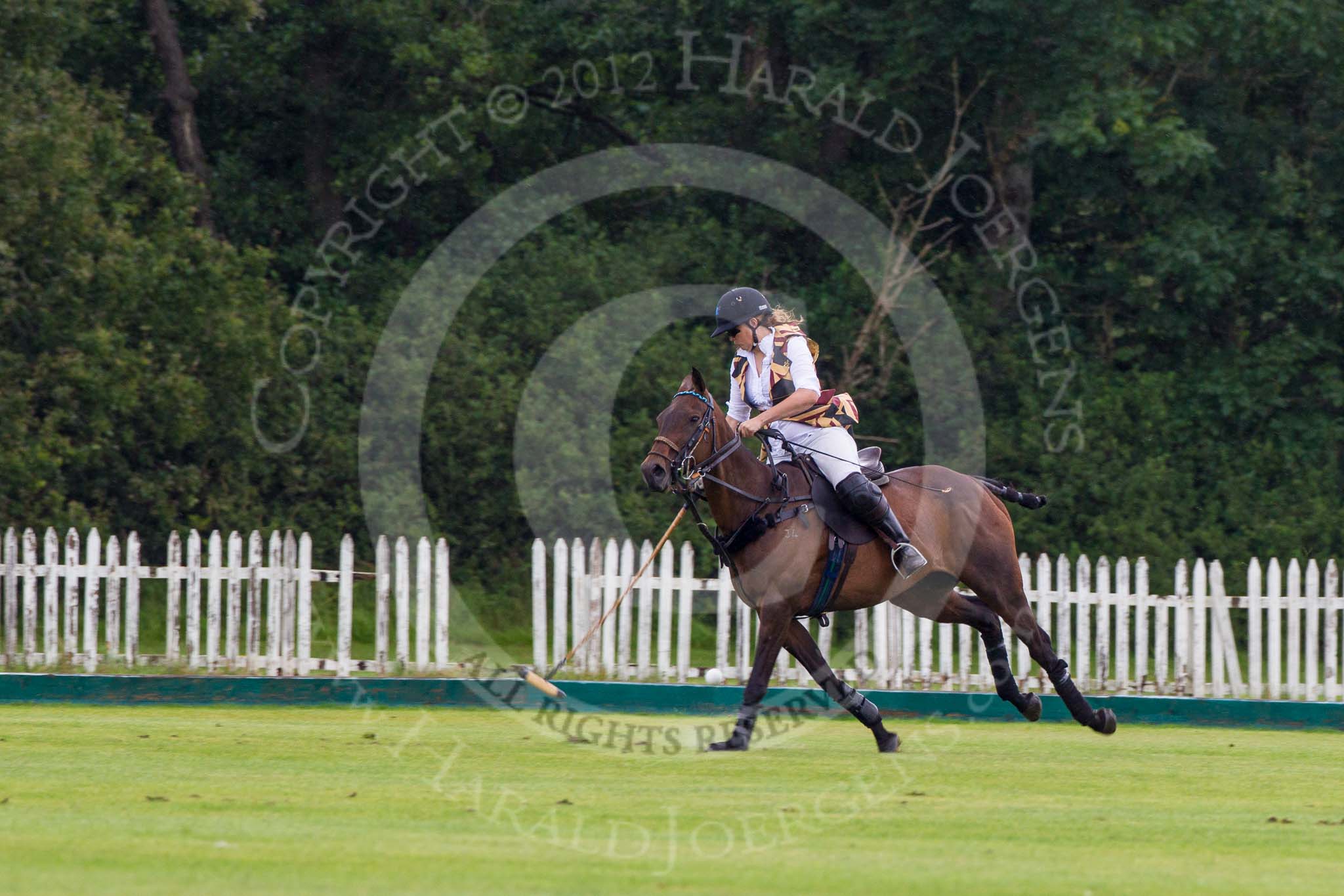 7th Heritage Polo Cup semi-finals: Rosie Ross..
Hurtwood Park Polo Club,
Ewhurst Green,
Surrey,
United Kingdom,
on 04 August 2012 at 13:10, image #98