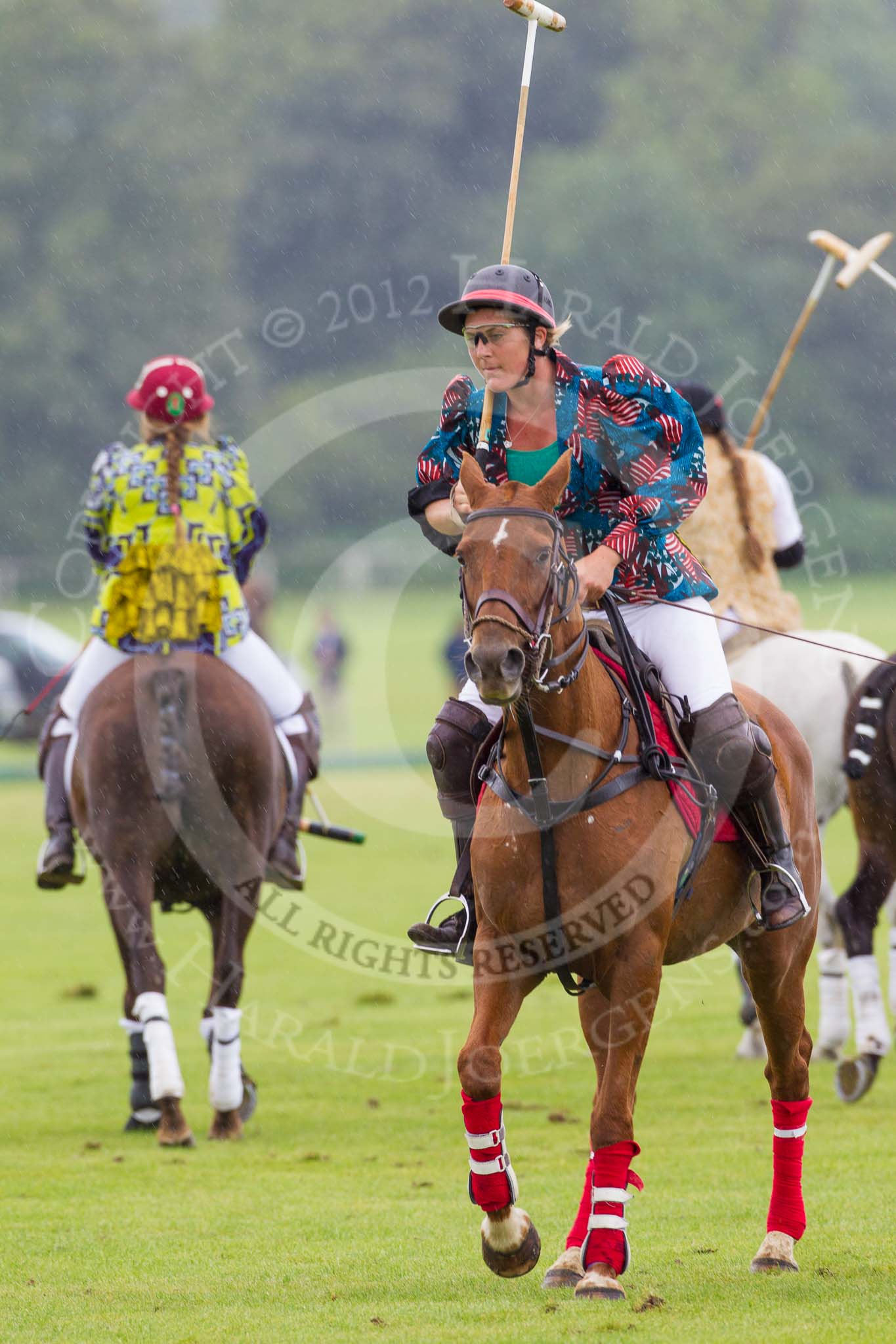 7th Heritage Polo Cup semi-finals: Annabel McNaught-Davis riding back to the pony lines..
Hurtwood Park Polo Club,
Ewhurst Green,
Surrey,
United Kingdom,
on 04 August 2012 at 14:05, image #200