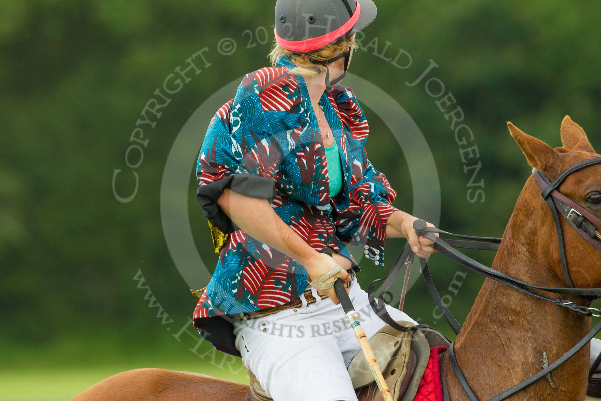 7th Heritage Polo Cup semi-finals: Annabel McNaught-Davis..
Hurtwood Park Polo Club,
Ewhurst Green,
Surrey,
United Kingdom,
on 04 August 2012 at 14:11, image #210