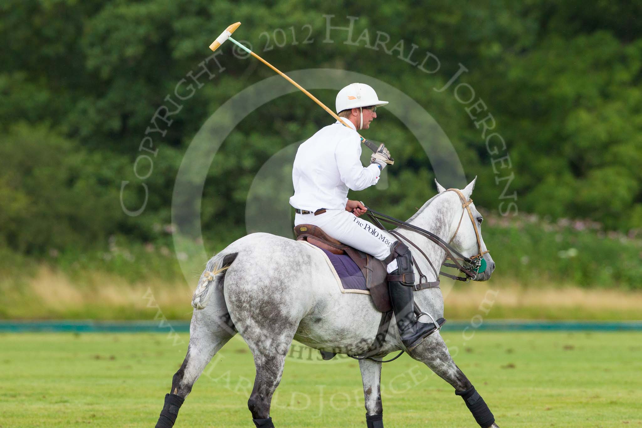 7th Heritage Polo Cup semi-finals: Pedro Harrison with his Best Playing Pony cantering back to centre..
Hurtwood Park Polo Club,
Ewhurst Green,
Surrey,
United Kingdom,
on 04 August 2012 at 15:45, image #274