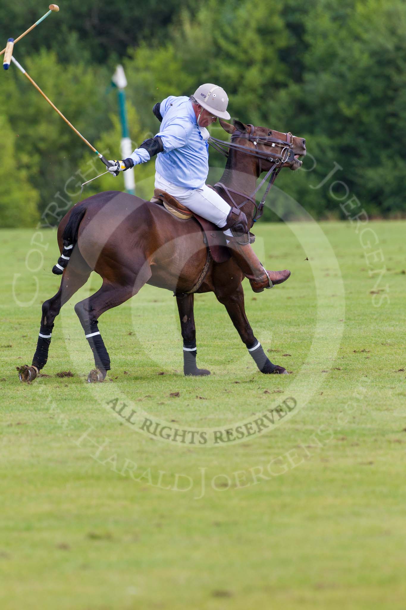 7th Heritage Polo Cup semi-finals: Mariano Darritchon with a back stroke..
Hurtwood Park Polo Club,
Ewhurst Green,
Surrey,
United Kingdom,
on 04 August 2012 at 15:55, image #301