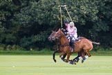 7th Heritage Polo Cup semi-finals: Nico Talamoni playing a nearside shot..
Hurtwood Park Polo Club,
Ewhurst Green,
Surrey,
United Kingdom,
on 04 August 2012 at 11:10, image #19