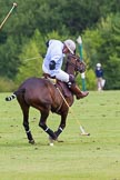 7th Heritage Polo Cup semi-finals: Mariano Darritchon stopping on the ball..
Hurtwood Park Polo Club,
Ewhurst Green,
Surrey,
United Kingdom,
on 04 August 2012 at 15:55, image #300