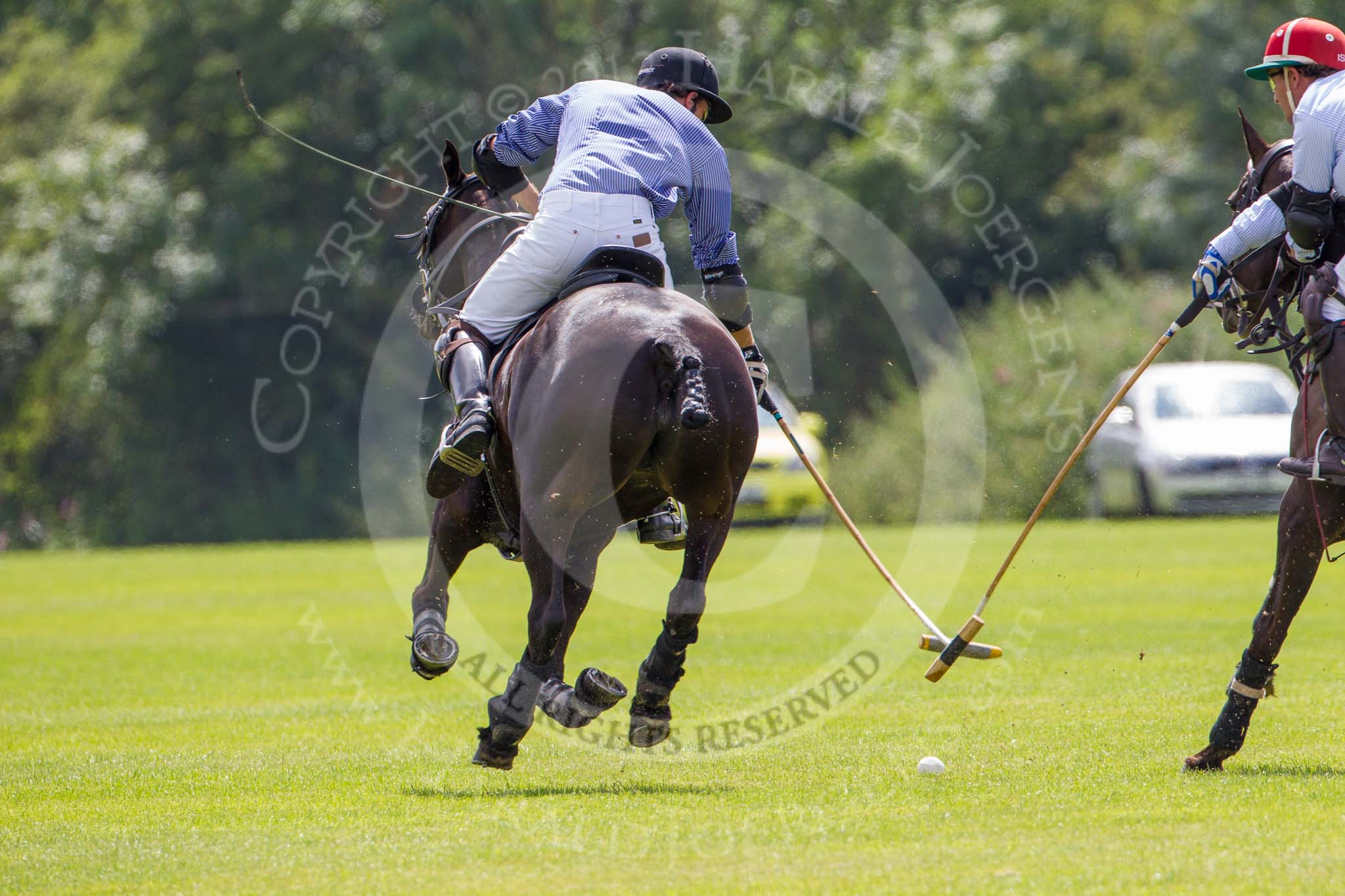7th Heritage Polo Cup finals: John Martin, left, and Sebastian Funes..
Hurtwood Park Polo Club,
Ewhurst Green,
Surrey,
United Kingdom,
on 05 August 2012 at 13:18, image #13