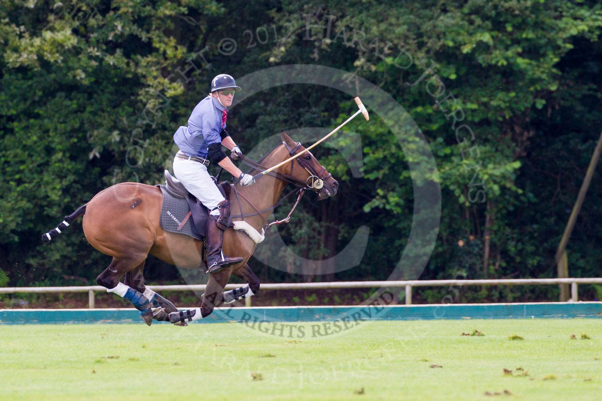 7th Heritage Polo Cup finals: Henry Fisher, Team Silver Fox USA..
Hurtwood Park Polo Club,
Ewhurst Green,
Surrey,
United Kingdom,
on 05 August 2012 at 13:39, image #37
