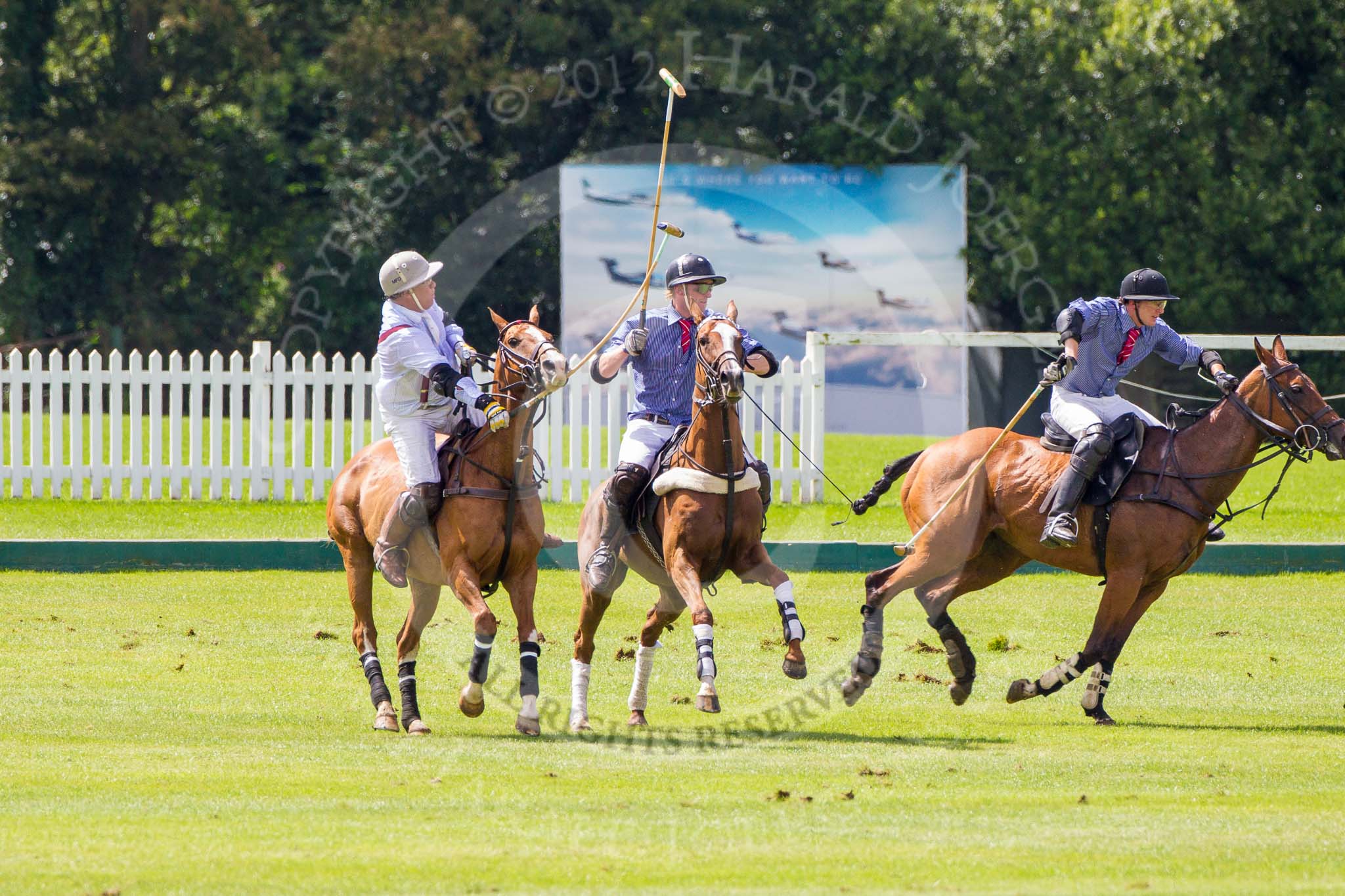 7th Heritage Polo Cup finals: Under the neck shot by Mariano Darritchon..
Hurtwood Park Polo Club,
Ewhurst Green,
Surrey,
United Kingdom,
on 05 August 2012 at 14:10, image #66