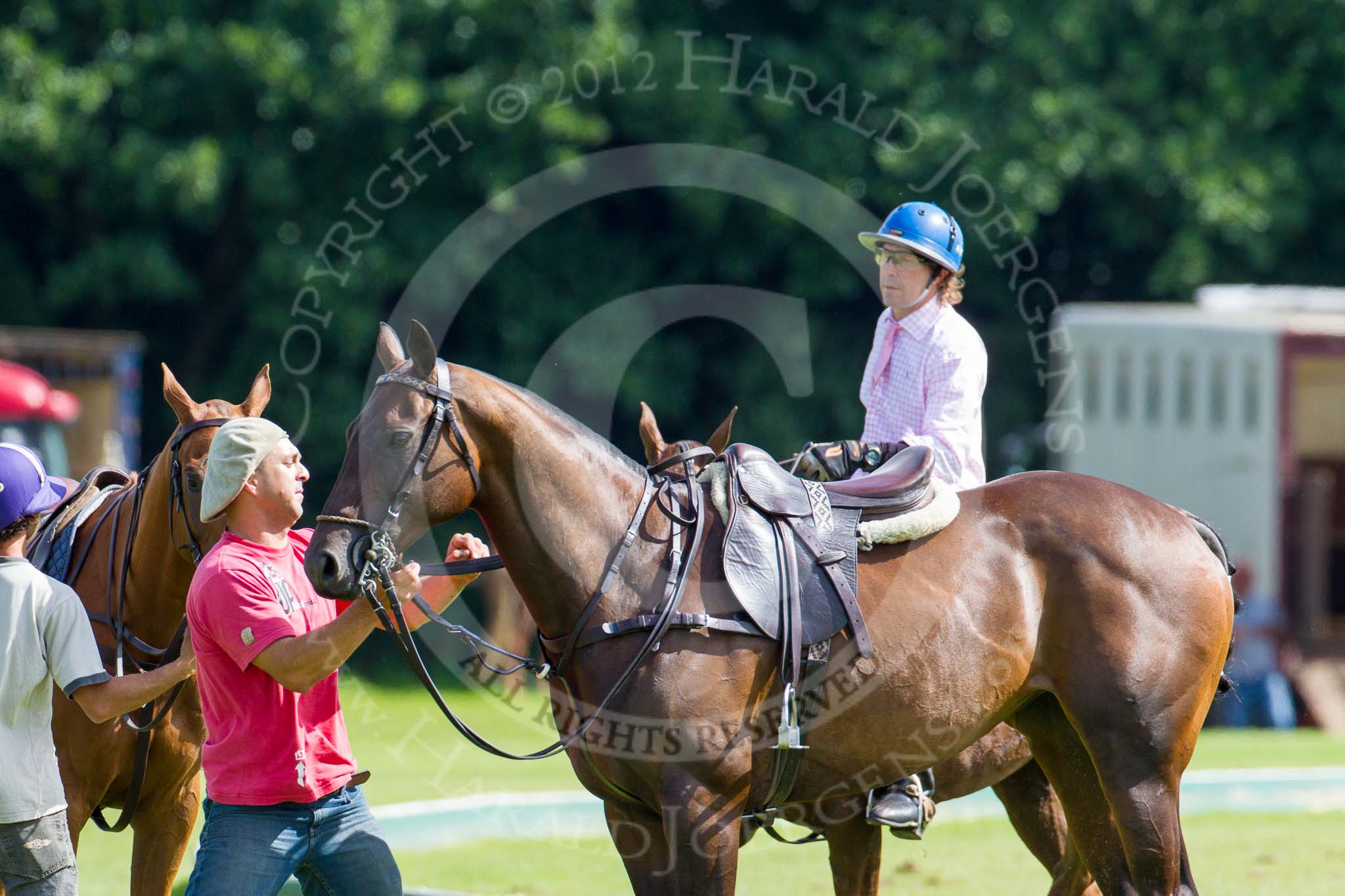 7th Heritage Polo Cup finals: Justo Saveedra and his groom..
Hurtwood Park Polo Club,
Ewhurst Green,
Surrey,
United Kingdom,
on 05 August 2012 at 15:38, image #181