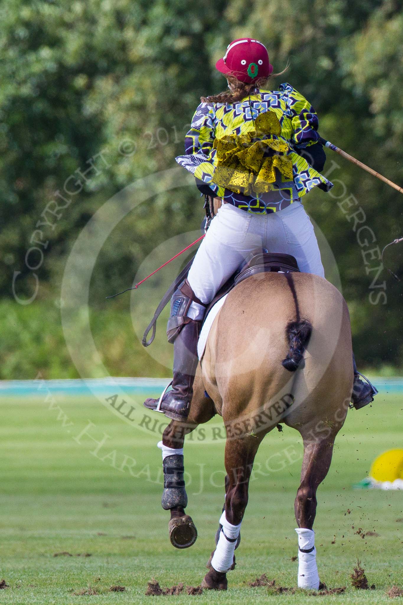 7th Heritage Polo Cup finals: AMG PETROENERGY Polo Player Sophie Kyriazi from Kenia, wearing a unique top of Nigerian Fashion Designer DNZY..
Hurtwood Park Polo Club,
Ewhurst Green,
Surrey,
United Kingdom,
on 05 August 2012 at 16:12, image #209