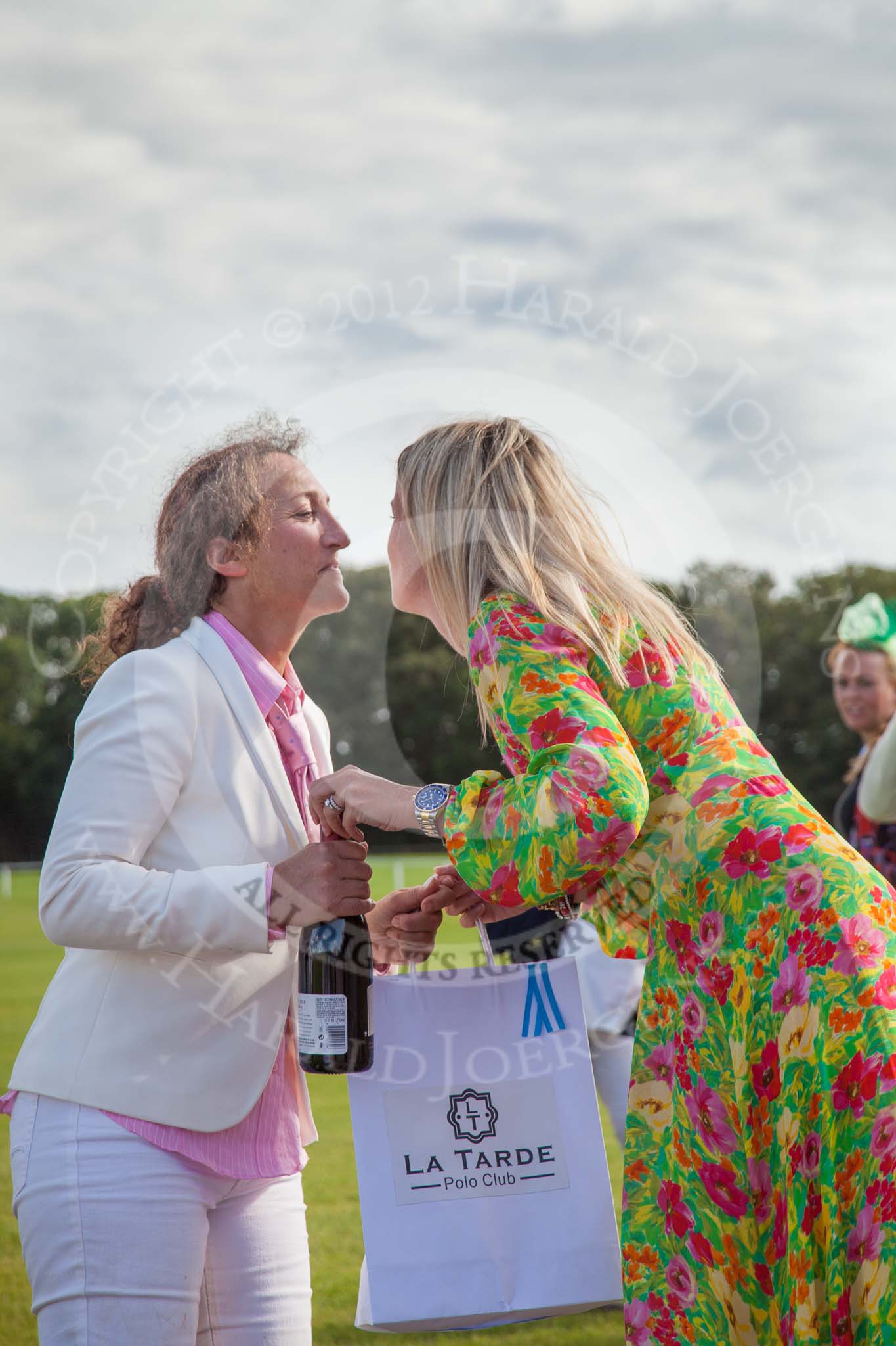 7th Heritage Polo Cup finals: Emerging Switzerland Sarah Krasker receiving La Tarde Polo Club Prizes with Clare Cotton of 'Cotton & Gems'..
Hurtwood Park Polo Club,
Ewhurst Green,
Surrey,
United Kingdom,
on 05 August 2012 at 17:06, image #272