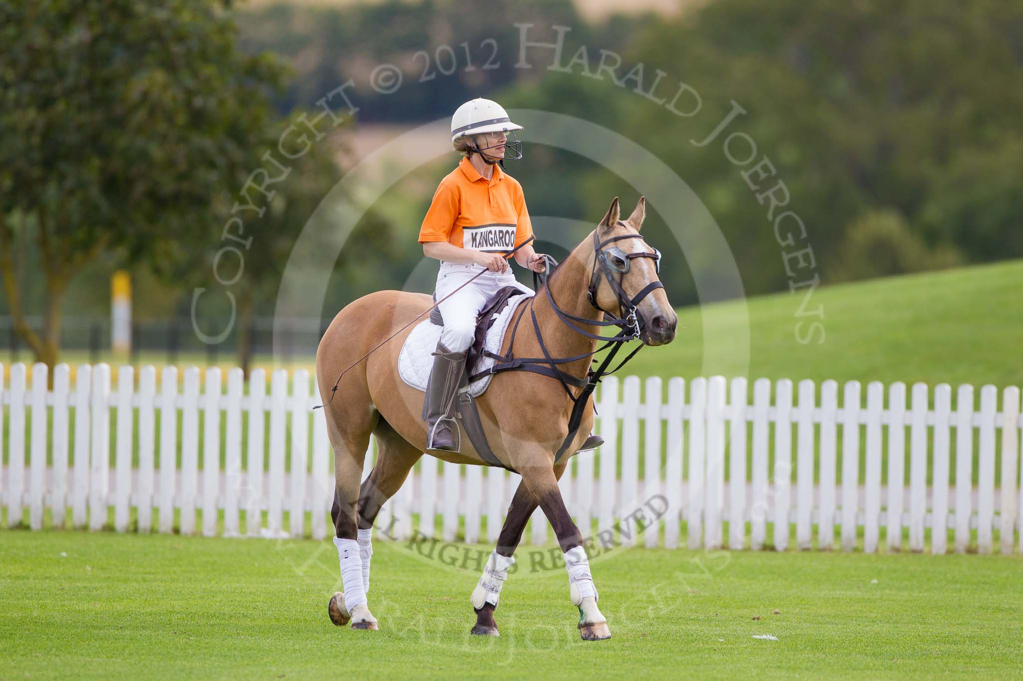 DBPC Polo in the Park 2012: Getting ready for the first match - Jane Kang, Kangaroos team..
Dallas Burston Polo Club,
Stoneythorpe Estate,
Southam,
Warwickshire,
United Kingdom,
on 16 September 2012 at 10:06, image #27