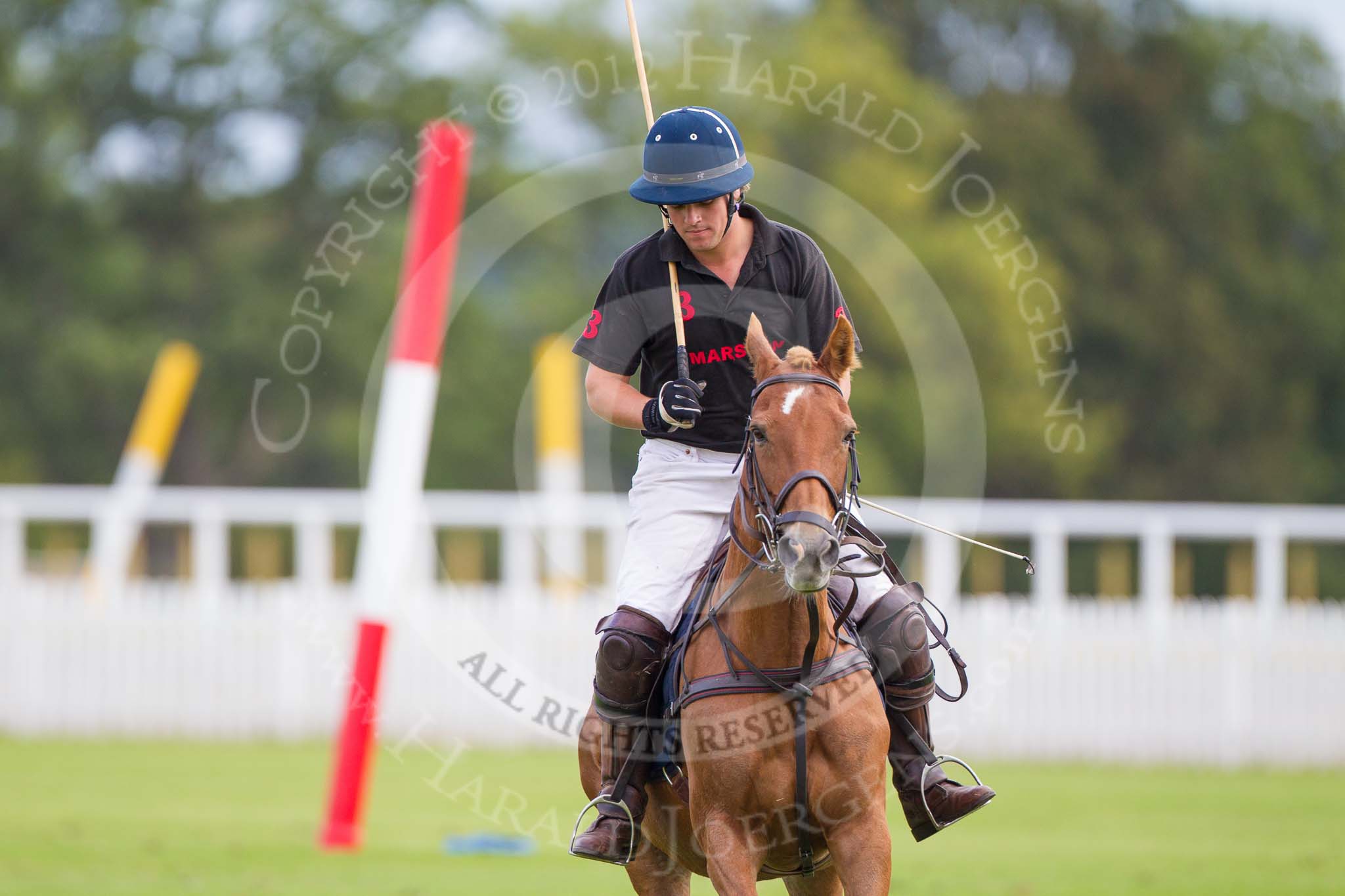 DBPC Polo in the Park 2012: Getting ready for the first match - Simon Marlow-Thomas of the Marston team..
Dallas Burston Polo Club,
Stoneythorpe Estate,
Southam,
Warwickshire,
United Kingdom,
on 16 September 2012 at 10:06, image #28