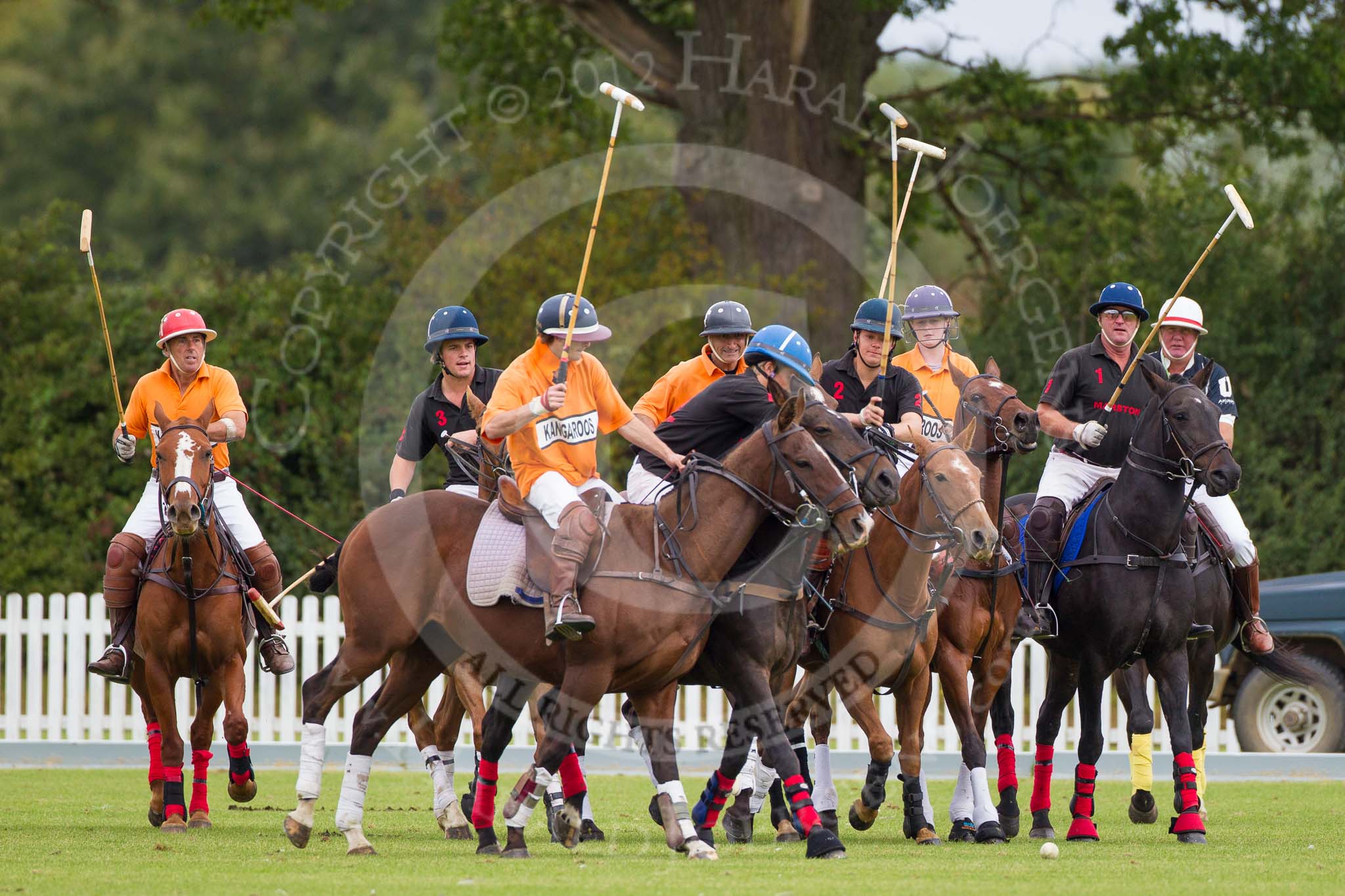 DBPC Polo in the Park 2012: After the second throw-in, Kangaroos v Marston, on the very right umpire Ian 'Ginger' Hunt..
Dallas Burston Polo Club,
Stoneythorpe Estate,
Southam,
Warwickshire,
United Kingdom,
on 16 September 2012 at 10:12, image #34