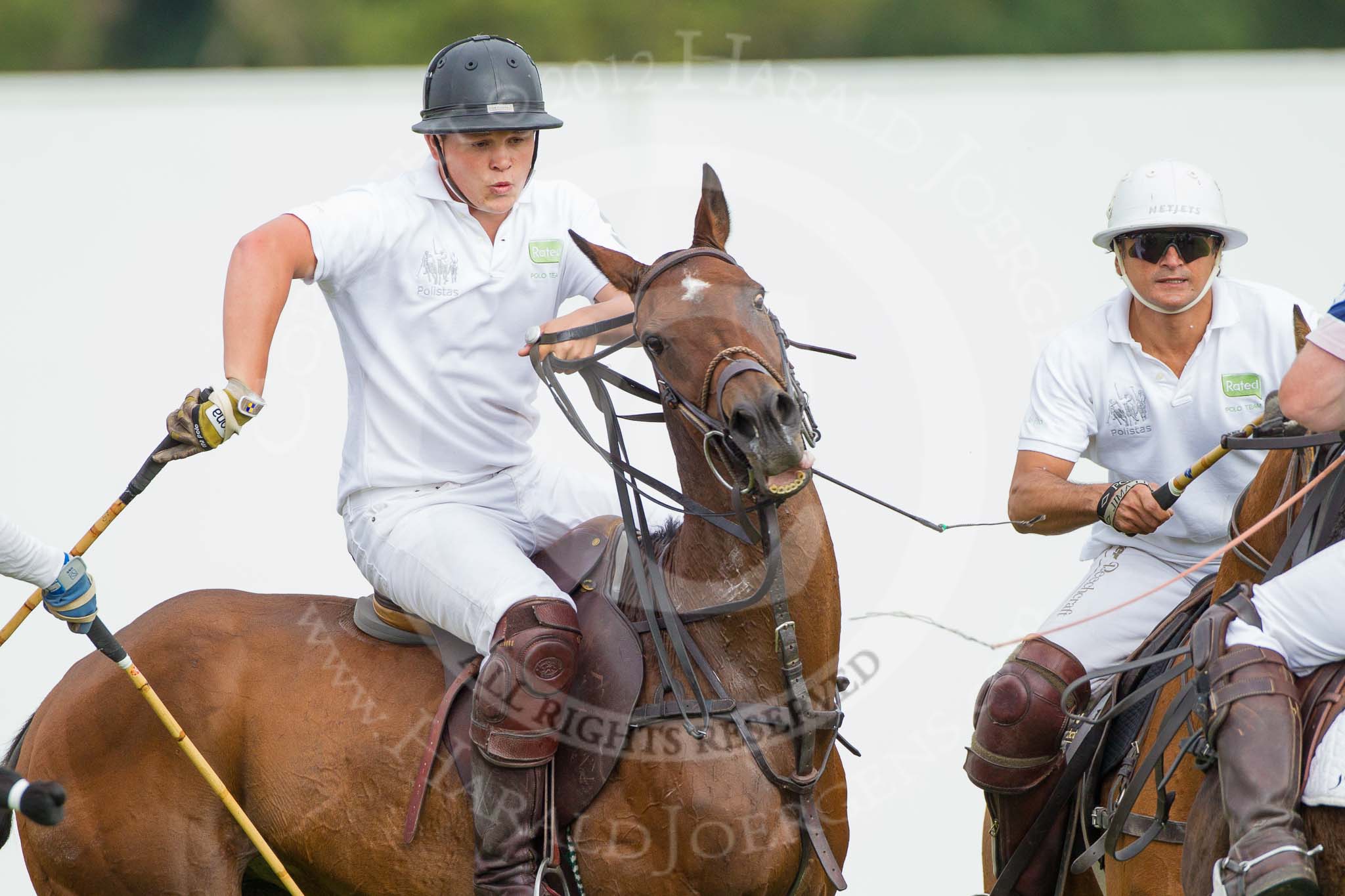 DBPC Polo in the Park 2012: Rated People Polo Team #3, Alex Vent, and #2, Tariq Dag Khan..
Dallas Burston Polo Club,
Stoneythorpe Estate,
Southam,
Warwickshire,
United Kingdom,
on 16 September 2012 at 11:02, image #67