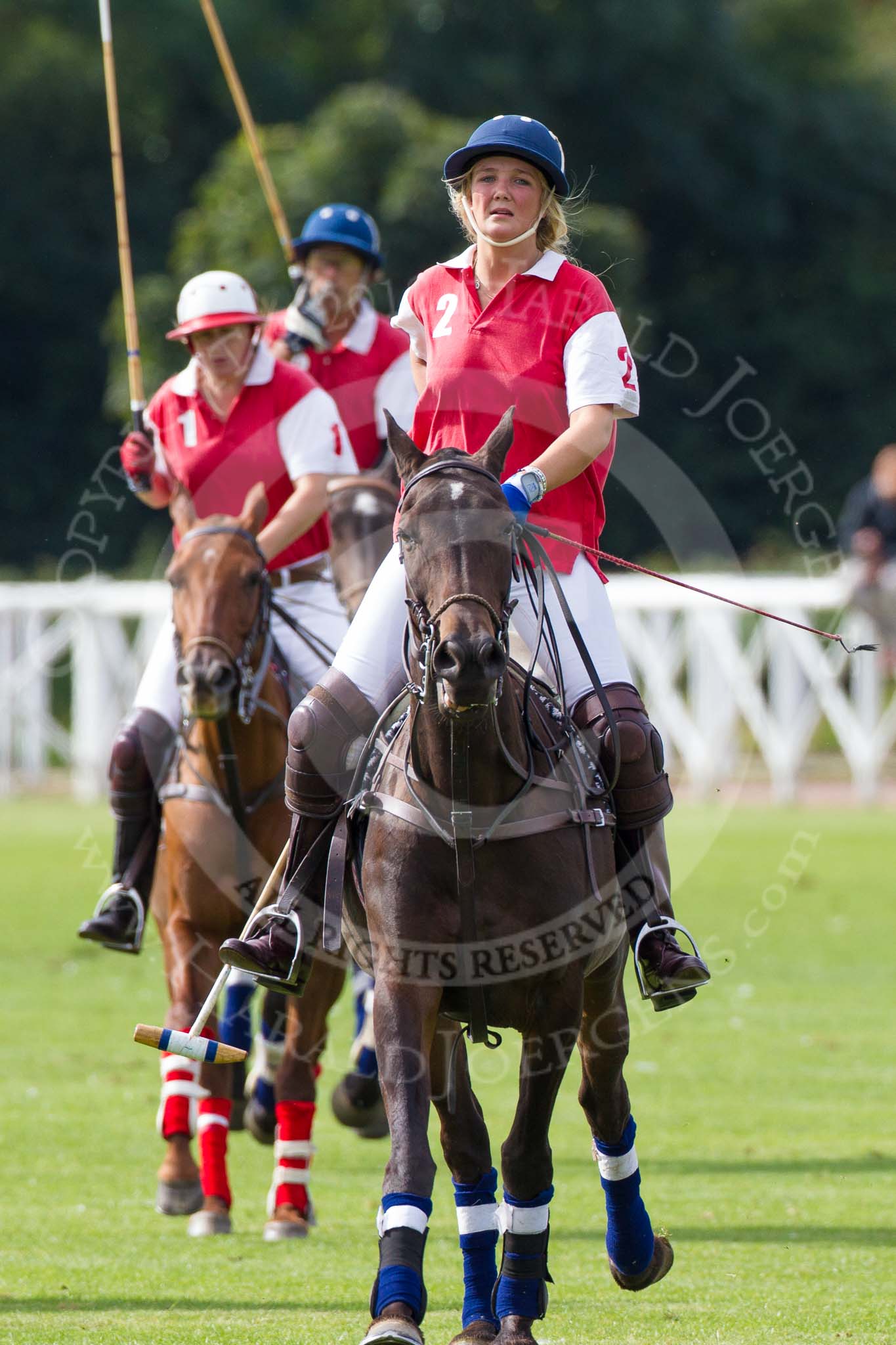 DBPC Polo in the Park 2012: Phoenix Polo Team #2, Jeanette Jones, #1, Molly Davies, and #3, Tomy Iriarte..
Dallas Burston Polo Club,
Stoneythorpe Estate,
Southam,
Warwickshire,
United Kingdom,
on 16 September 2012 at 11:56, image #108