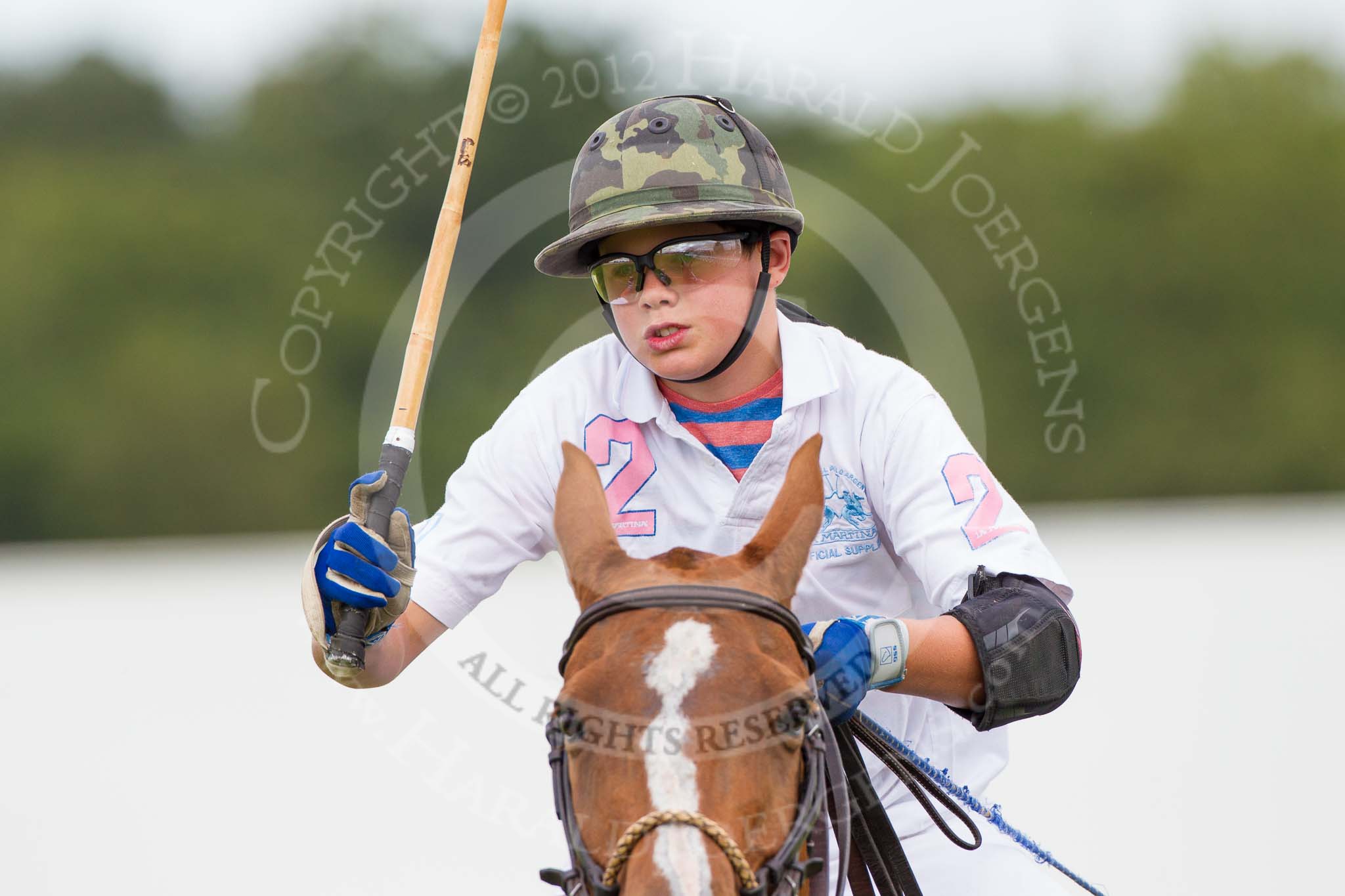 DBPC Polo in the Park 2012: Dawson Group Polo Team #2, Josh Cork..
Dallas Burston Polo Club,
Stoneythorpe Estate,
Southam,
Warwickshire,
United Kingdom,
on 16 September 2012 at 12:40, image #127