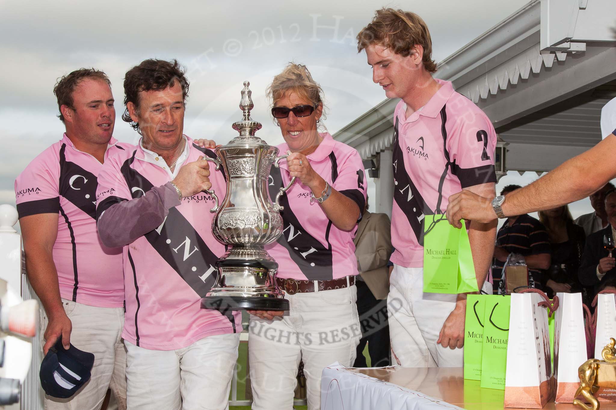 DBPC Polo in the Park 2012: The C.A.N.I. team, winner of the 4 Goal Tusk Trophy Tournament - Grant Collett, Sebastian Funes, Louise Jebsen, and Jamie Potter..
Dallas Burston Polo Club,
Stoneythorpe Estate,
Southam,
Warwickshire,
United Kingdom,
on 16 September 2012 at 16:40, image #253