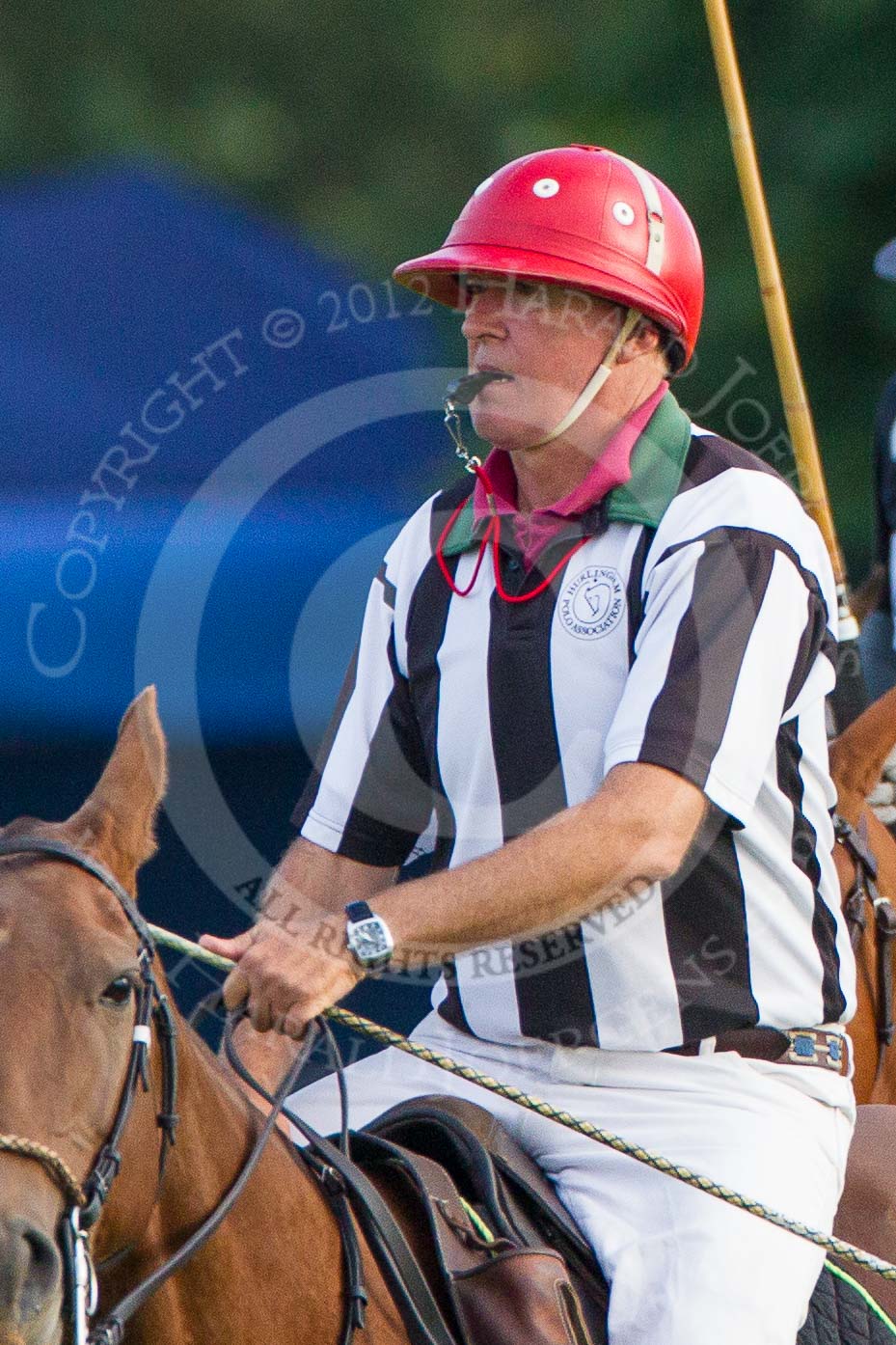 DBPC Polo in the Park 2012: Umpire Martin Fewster..
Dallas Burston Polo Club,
Stoneythorpe Estate,
Southam,
Warwickshire,
United Kingdom,
on 16 September 2012 at 17:21, image #273