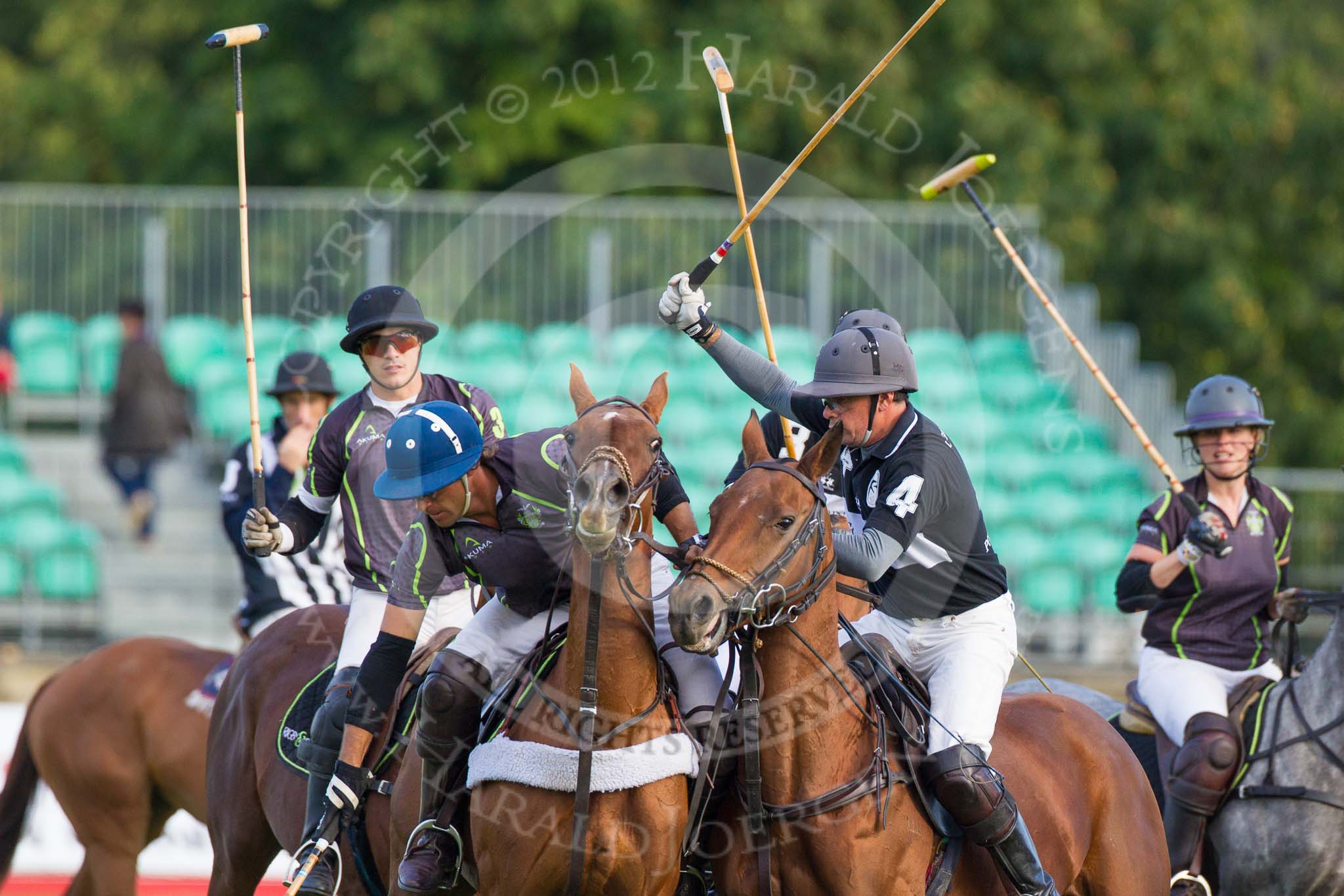 DBPC Polo in the Park 2012: Rigby & Rigby v La Golondrina after a throw-in..
Dallas Burston Polo Club,
Stoneythorpe Estate,
Southam,
Warwickshire,
United Kingdom,
on 16 September 2012 at 17:21, image #275