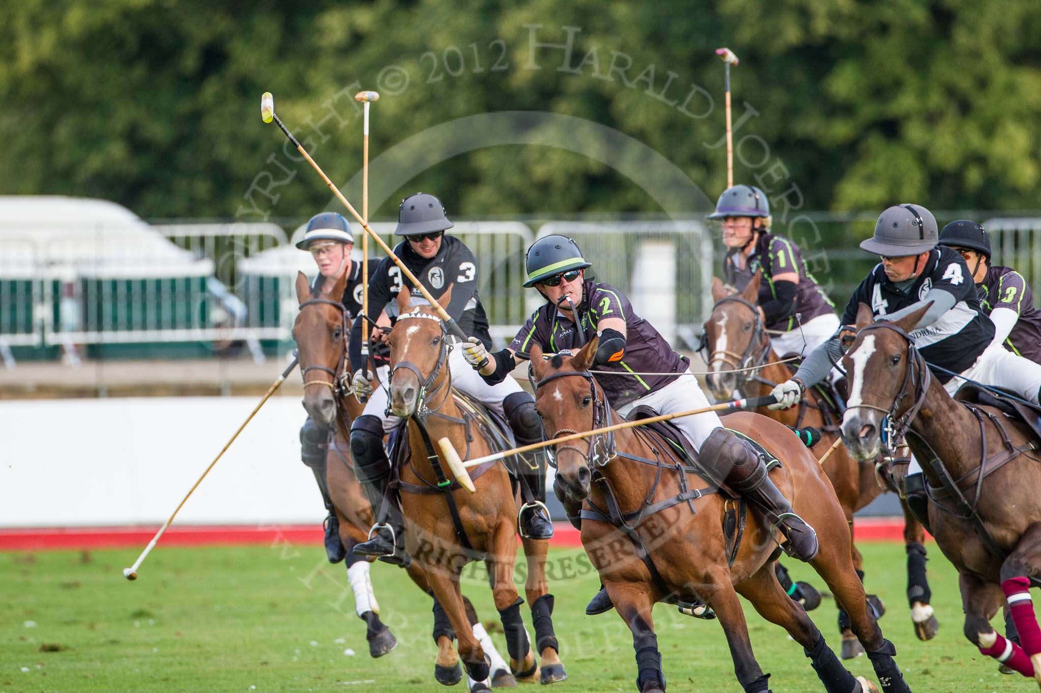 DBPC Polo in the Park 2012: Rigby & Rigby #2, Steve Rigby, and La Golondrina #4, Matias Carrique..
Dallas Burston Polo Club,
Stoneythorpe Estate,
Southam,
Warwickshire,
United Kingdom,
on 16 September 2012 at 17:37, image #287