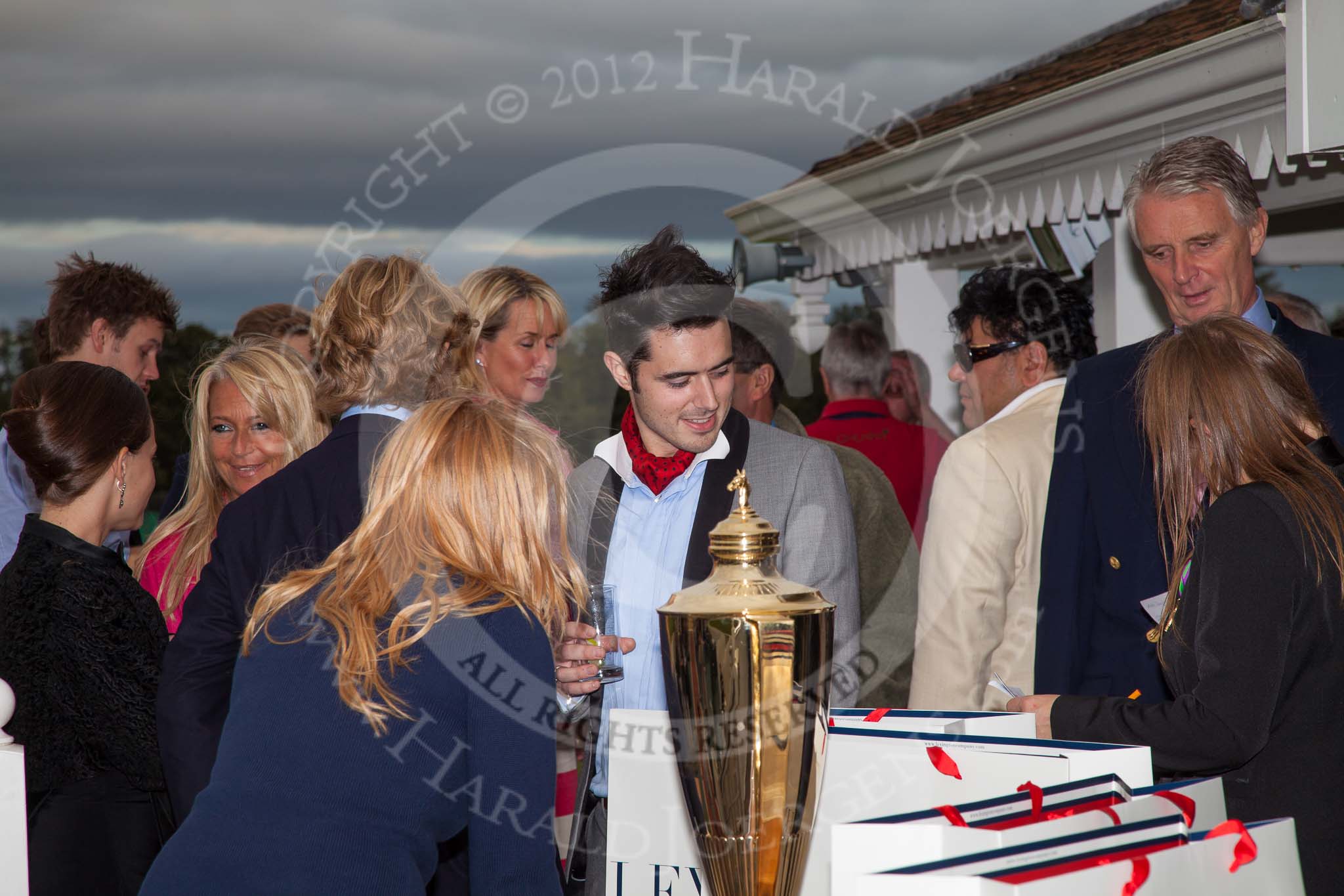 DBPC Polo in the Park 2012: Getting ready for the price-giving for the Dallas Burston Gold Cup Tournament. On the very right Dr Dallas Burston, behind him Prince Joseph of the Shan States. and on the very left Princess Lydia Galitzine..
Dallas Burston Polo Club,
Stoneythorpe Estate,
Southam,
Warwickshire,
United Kingdom,
on 16 September 2012 at 18:05, image #304