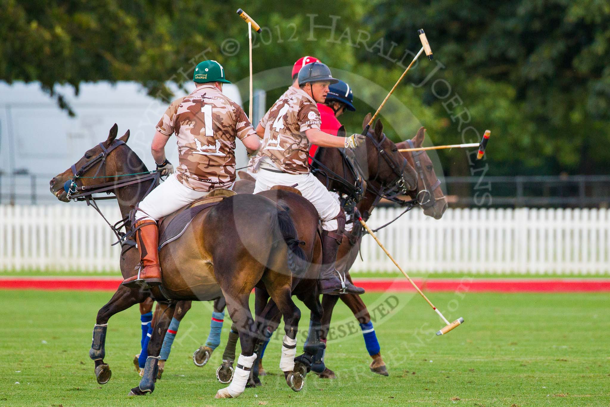 DBPC Polo in the Park 2012: Royal Artillery #1, Bombardier Richard Morris, #2, Alex Vent, #2, Major Andy Wood, and DBPC #3, Mark Weller..
Dallas Burston Polo Club,
Stoneythorpe Estate,
Southam,
Warwickshire,
United Kingdom,
on 16 September 2012 at 18:37, image #327