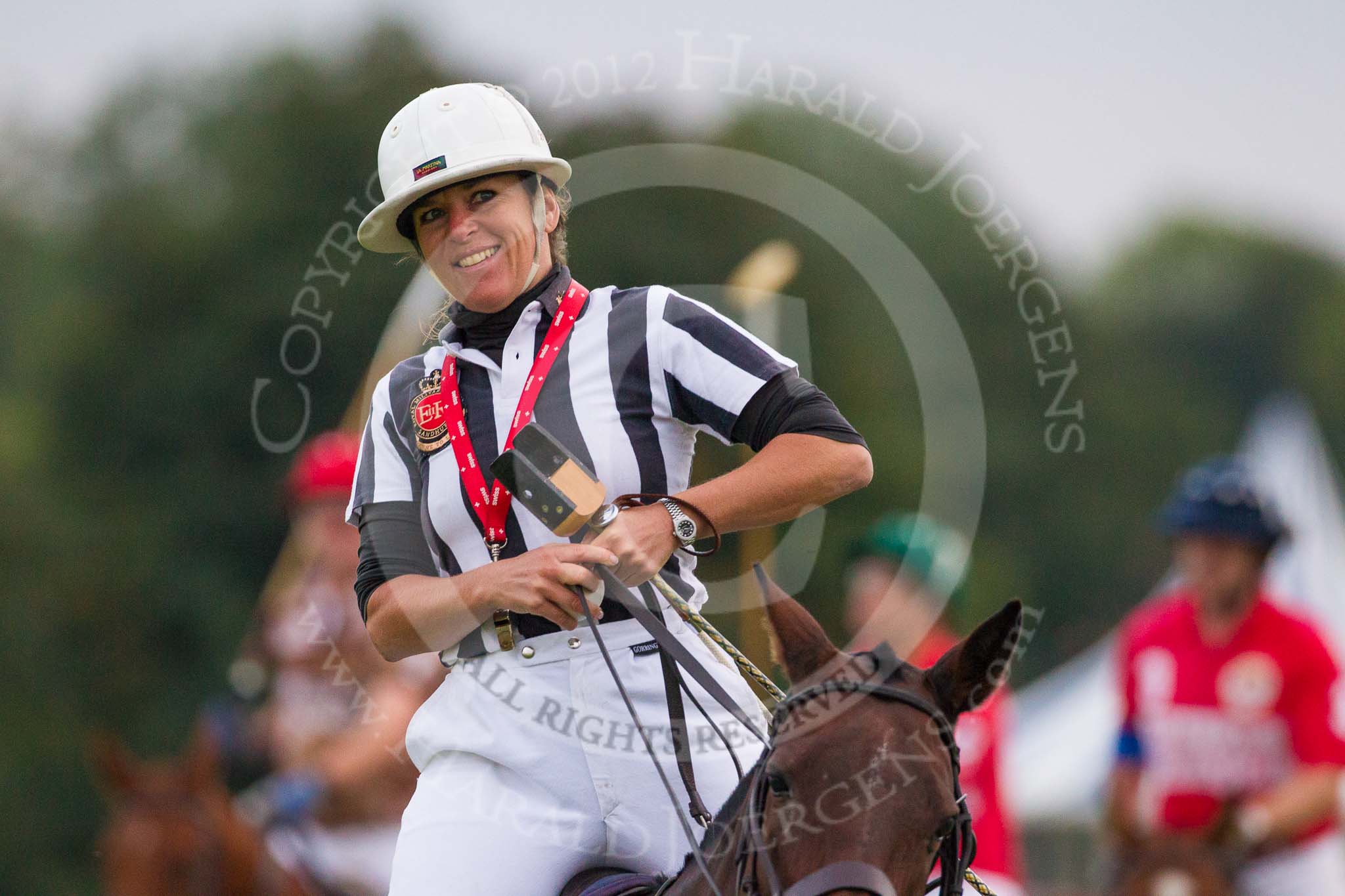 DBPC Polo in the Park 2012: Swiss umpire Barbara Zingg, former Polo Manager of the Royal Military Academy Sandhurst and founder of Heritage Polo..
Dallas Burston Polo Club,
Stoneythorpe Estate,
Southam,
Warwickshire,
United Kingdom,
on 16 September 2012 at 18:57, image #339