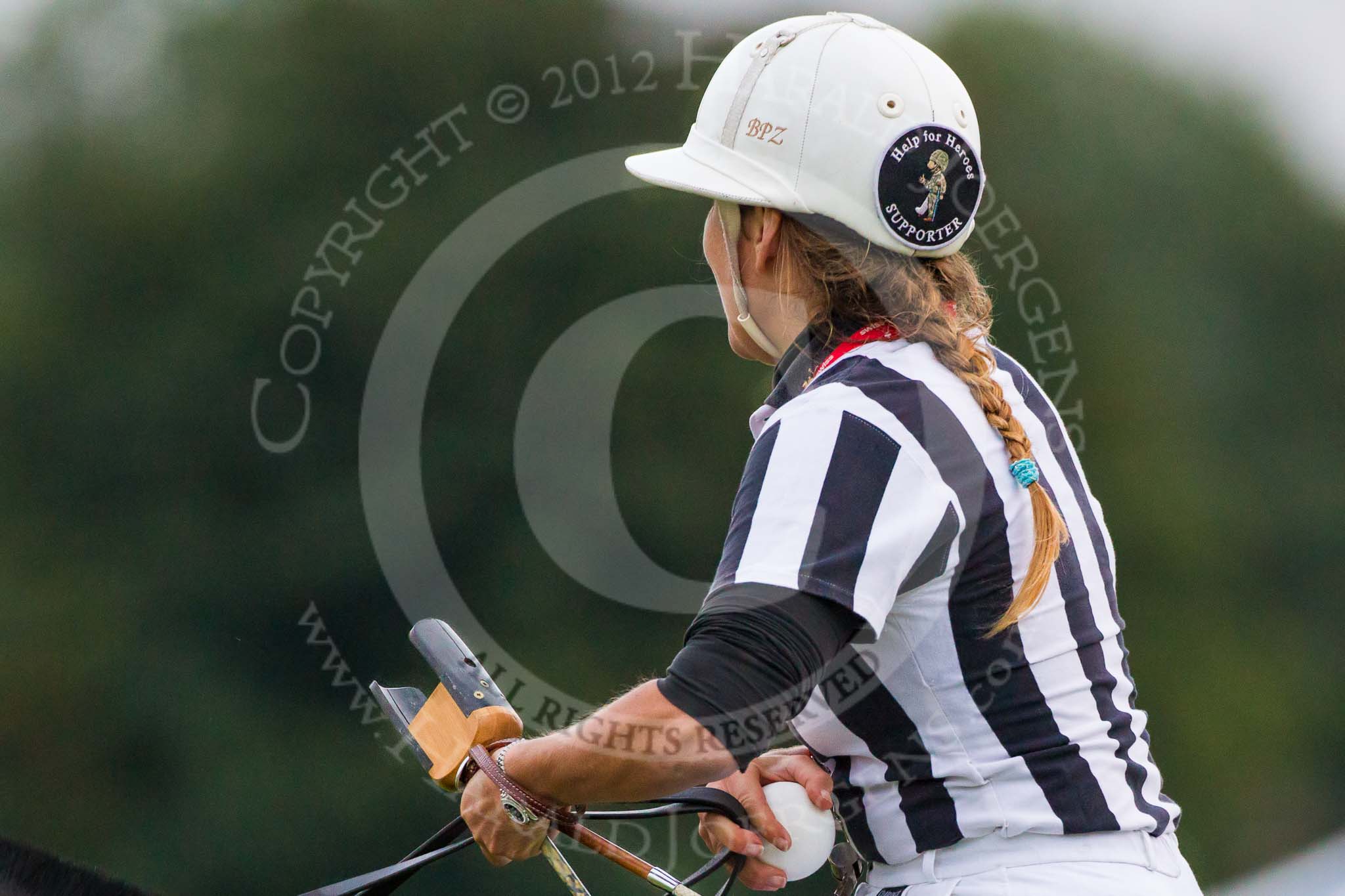 DBPC Polo in the Park 2012: Umpire Barbara Zingg showing her support for "Help the Heroes"..
Dallas Burston Polo Club,
Stoneythorpe Estate,
Southam,
Warwickshire,
United Kingdom,
on 16 September 2012 at 18:57, image #340