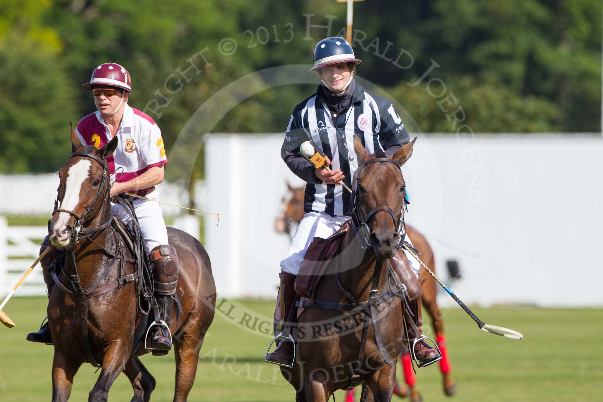 DBPC Polo in the Park 2013, Subsidiary Final Amaranther Trophy (0 Goal), Leadenham vs Kingsbridge: Stewert Hickman (Kingsbridge) and umpire Crispin Matthews..
Dallas Burston Polo Club, ,
Southam,
Warwickshire,
United Kingdom,
on 01 September 2013 at 10:31, image #38