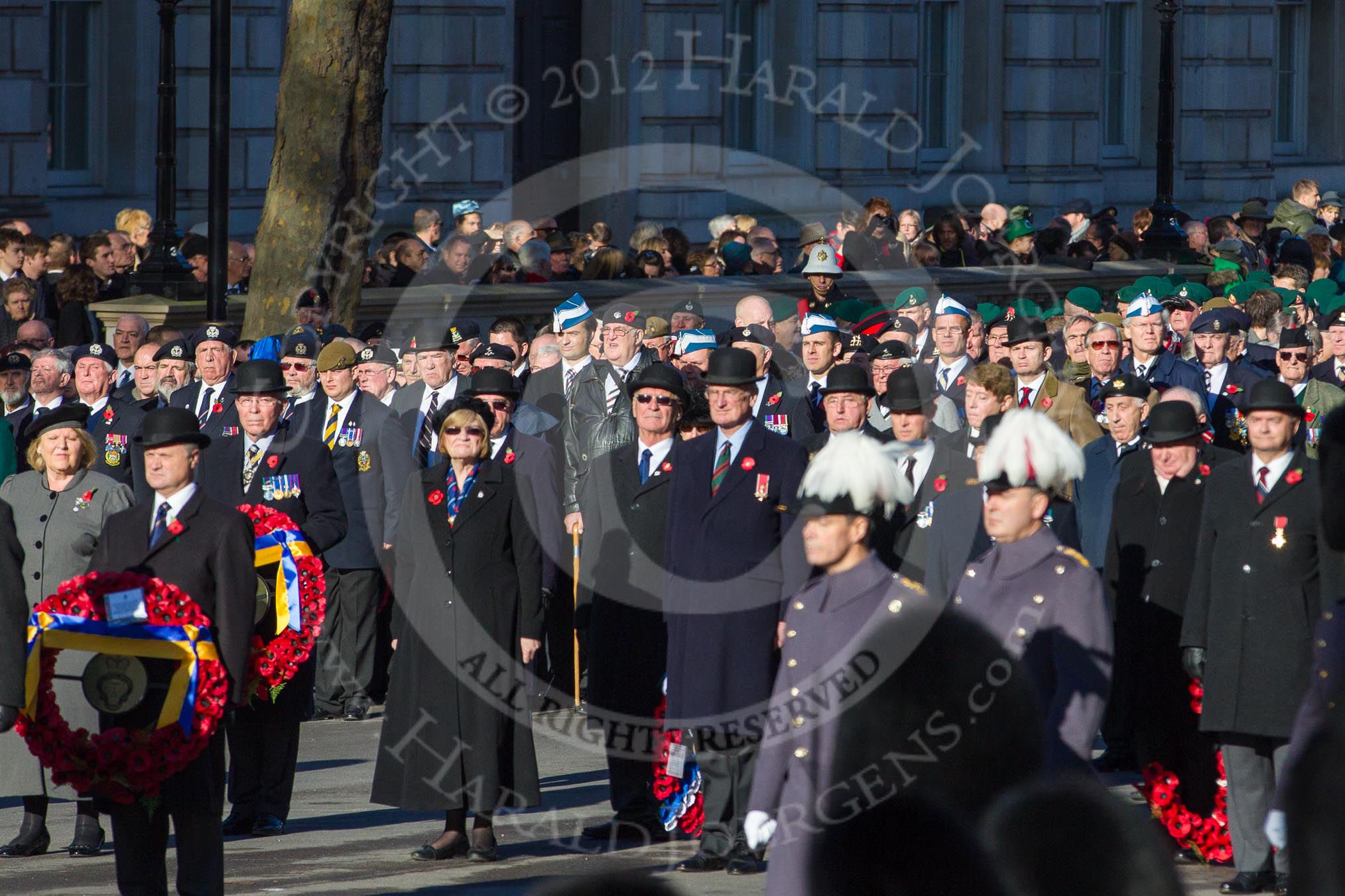 Remembrance Sunday 2012 Cenotaph March Past: Minutes before the start of  the march-mast..
Whitehall, Cenotaph,
London SW1,

United Kingdom,
on 11 November 2012 at 11:25, image #1