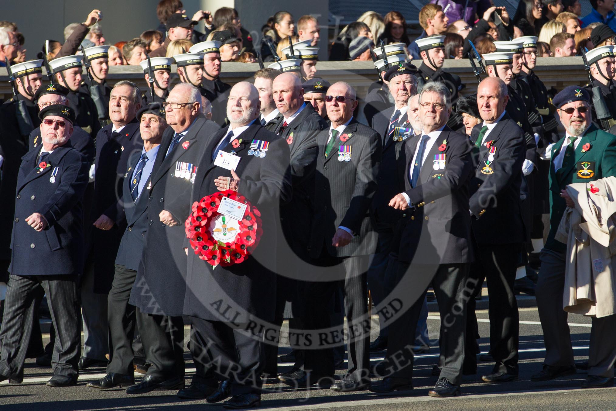 Remembrance Sunday 2012 Cenotaph March Past: The Fleet Air Arm Armourers Association, formed at the outbreak of WW2 to give firepower and air cover to the Atlantic convoys. With the Wreath Chief Petty Officer Mick Holdsworth, next to him the chairman, Detective Chief Inspector Mick Grubb QPM..
Whitehall, Cenotaph,
London SW1,

United Kingdom,
on 11 November 2012 at 11:39, image #92