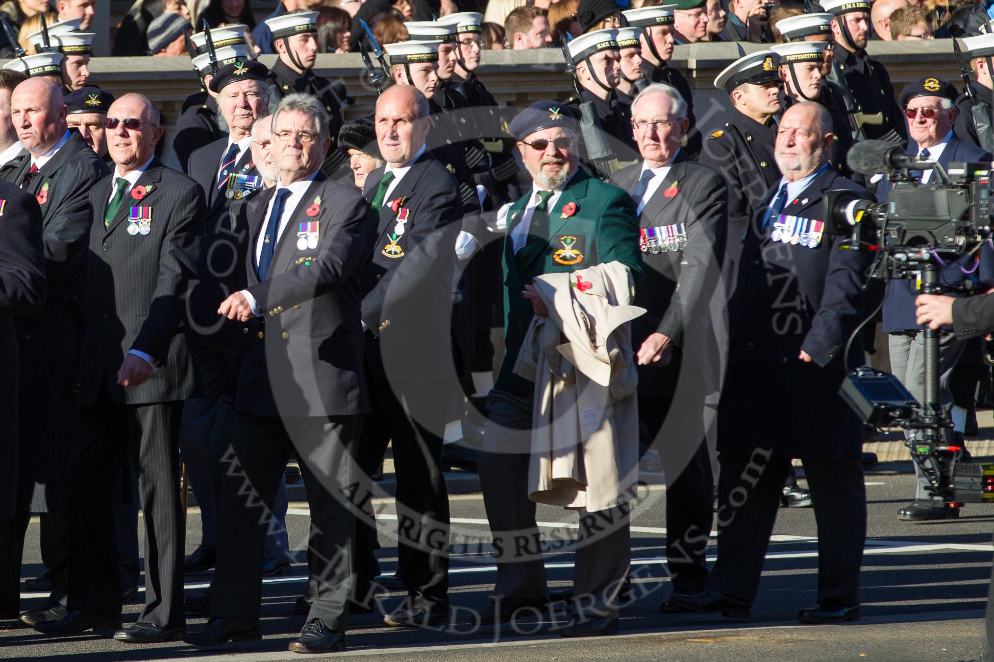 Remembrance Sunday 2012 Cenotaph March Past: Group E8 - The Fleet Air Arm Armourers Association, formed at the outbreak of WW2 to give firepower and air cover to the Atlantic convoys..
Whitehall, Cenotaph,
London SW1,

United Kingdom,
on 11 November 2012 at 11:39, image #93