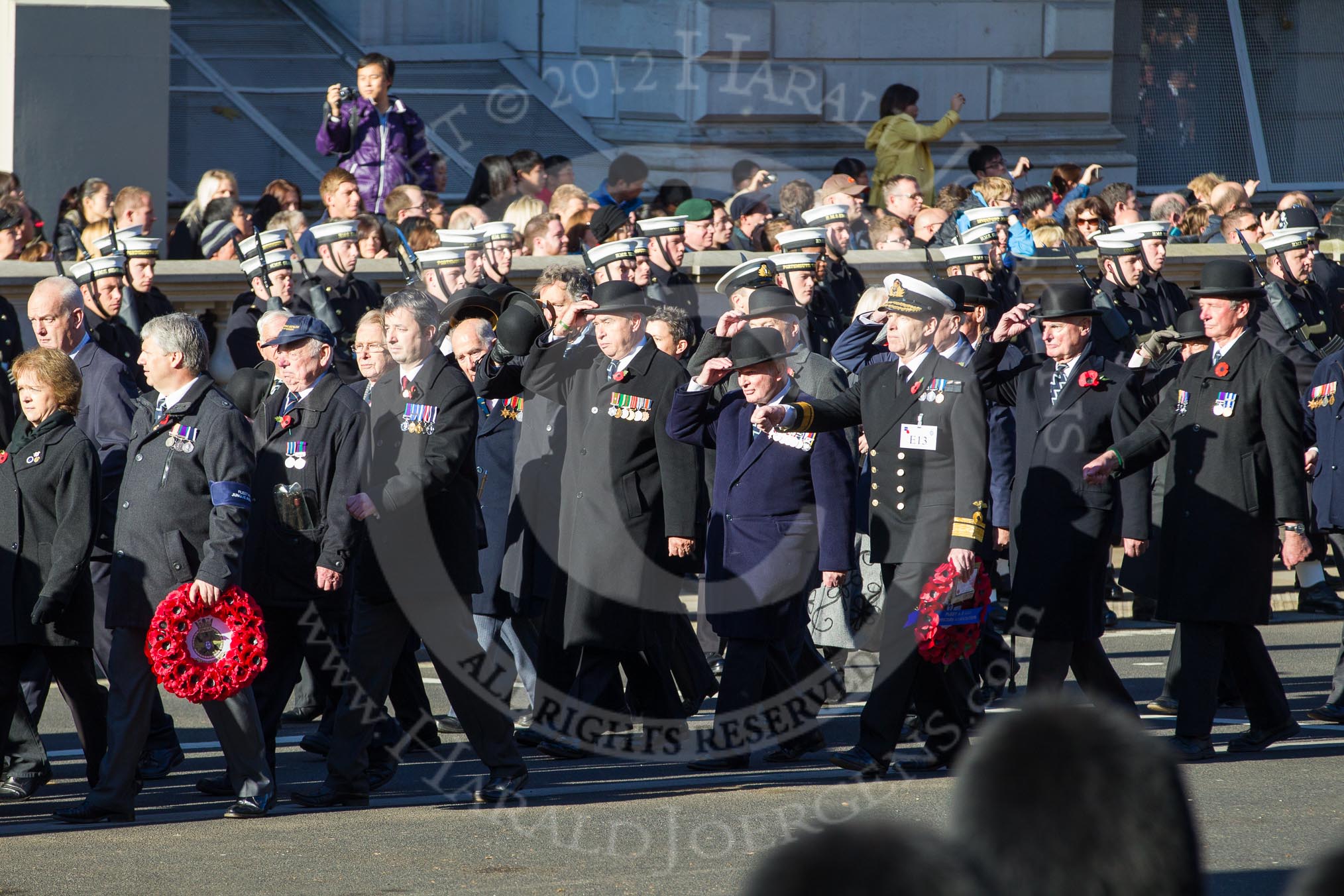 Remembrance Sunday 2012 Cenotaph March Past: Group E12 - Fleet Air Arm Junglie Association, and E13 - Fleet Air Arm Officers Association..
Whitehall, Cenotaph,
London SW1,

United Kingdom,
on 11 November 2012 at 11:39, image #107