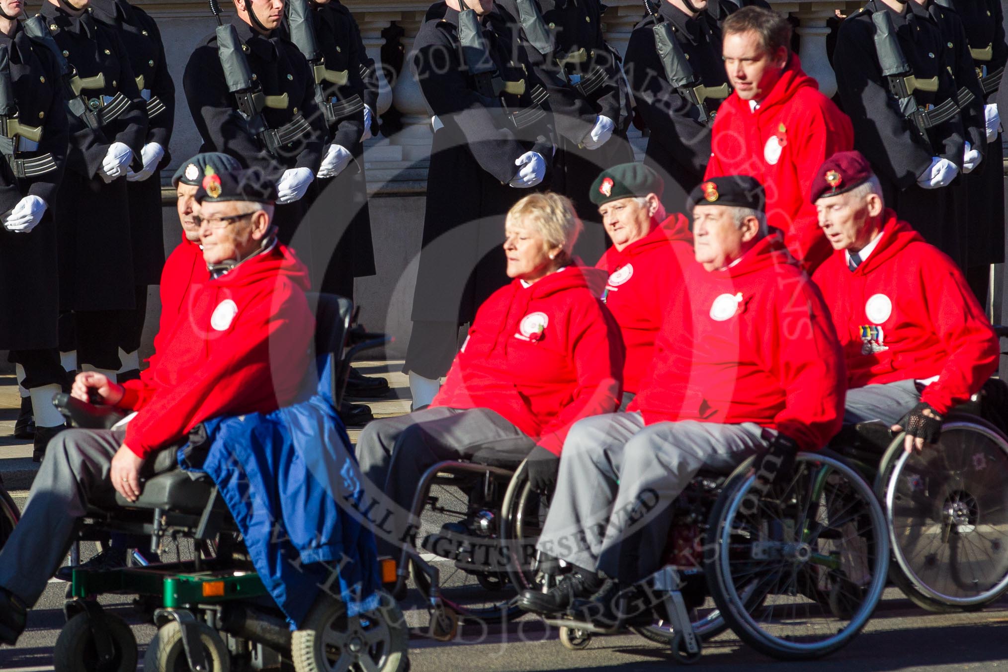 Remembrance Sunday 2012 Cenotaph March Past: Group E42 - British Ex-Services Wheelchair Sports Association..
Whitehall, Cenotaph,
London SW1,

United Kingdom,
on 11 November 2012 at 11:43, image #326