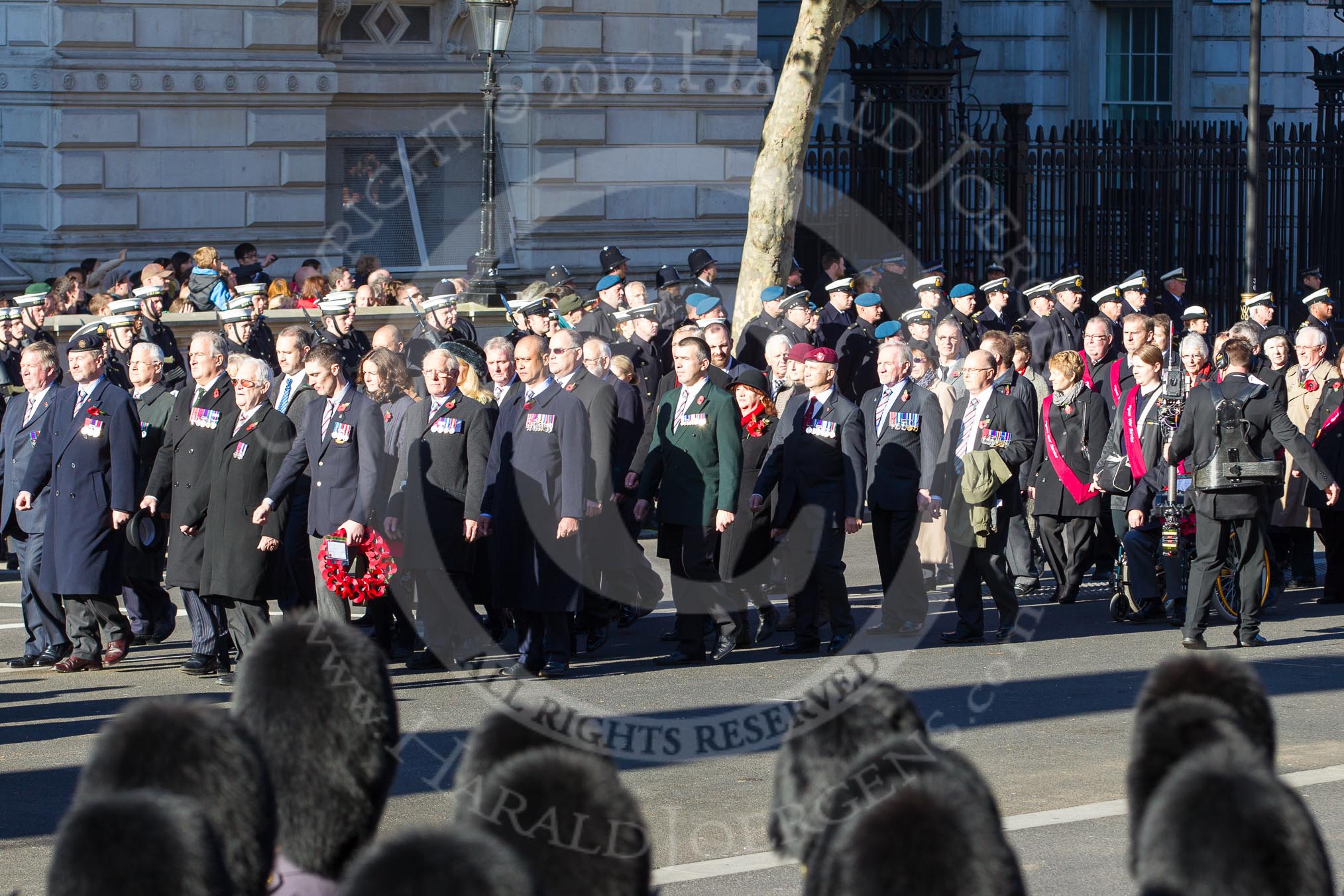 Remembrance Sunday 2012 Cenotaph March Past: Group F13 - Gallantry Medallists League and F14 - National Pigeon War Service..
Whitehall, Cenotaph,
London SW1,

United Kingdom,
on 11 November 2012 at 11:47, image #486
