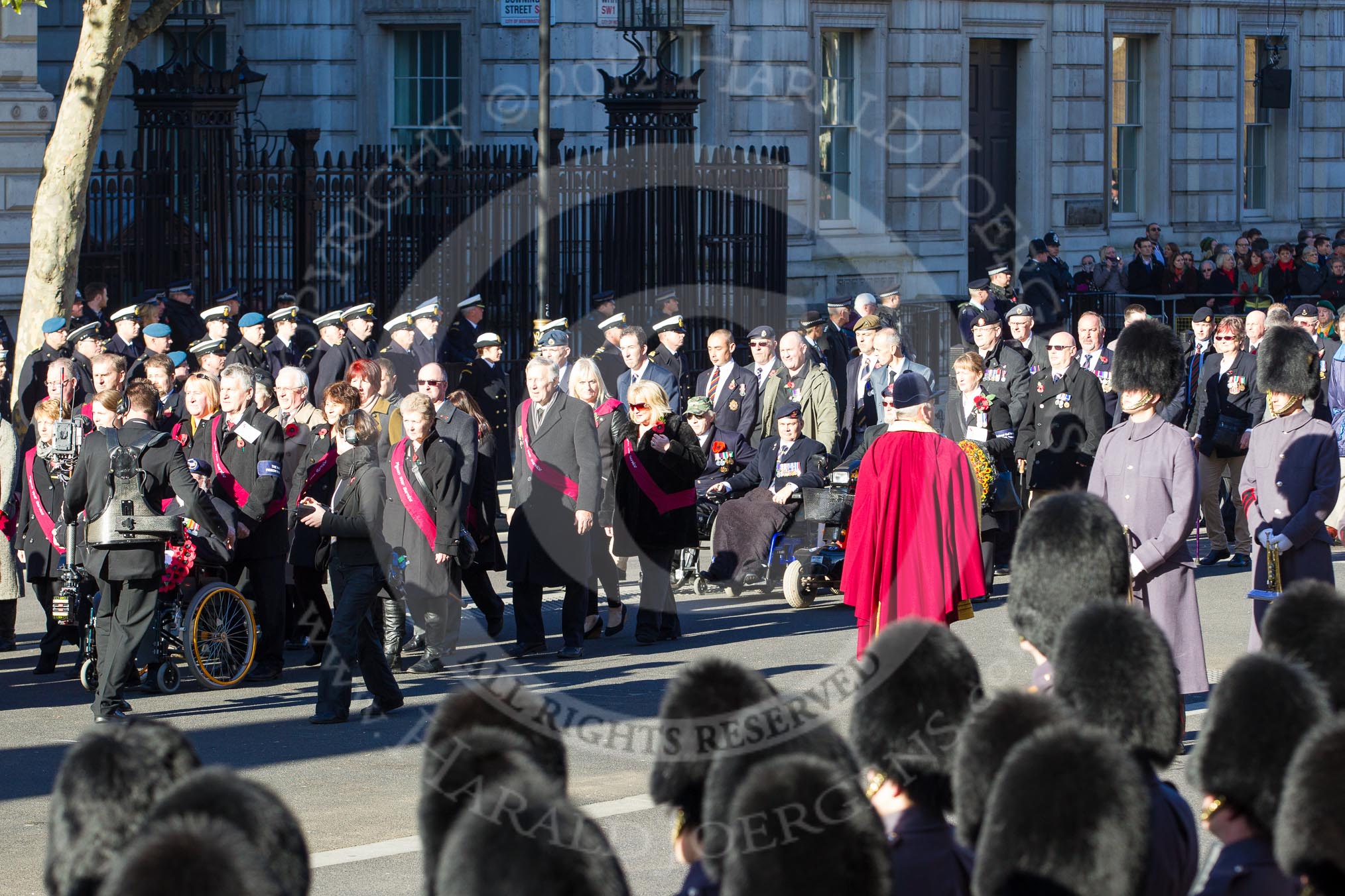 Remembrance Sunday 2012 Cenotaph March Past: Group F14 - National Pigeon War Service and F15 - National Gulf Veterans & Families Association..
Whitehall, Cenotaph,
London SW1,

United Kingdom,
on 11 November 2012 at 11:47, image #492