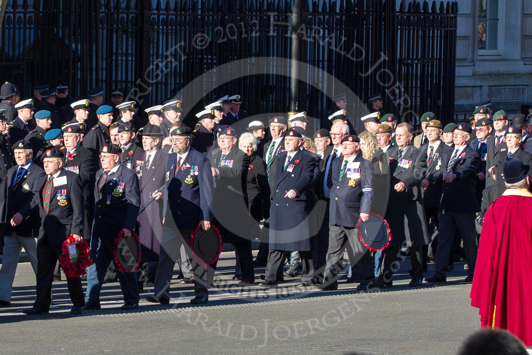 Remembrance Sunday 2012 Cenotaph March Past: Group A9 - Green Howards Association, A10 - Duke of Wellington's Regiment, A11 - Cheshire Regiment Association., and A12 - Sherwood Foresters & Worcestershire Regiment..
Whitehall, Cenotaph,
London SW1,

United Kingdom,
on 11 November 2012 at 11:49, image #609