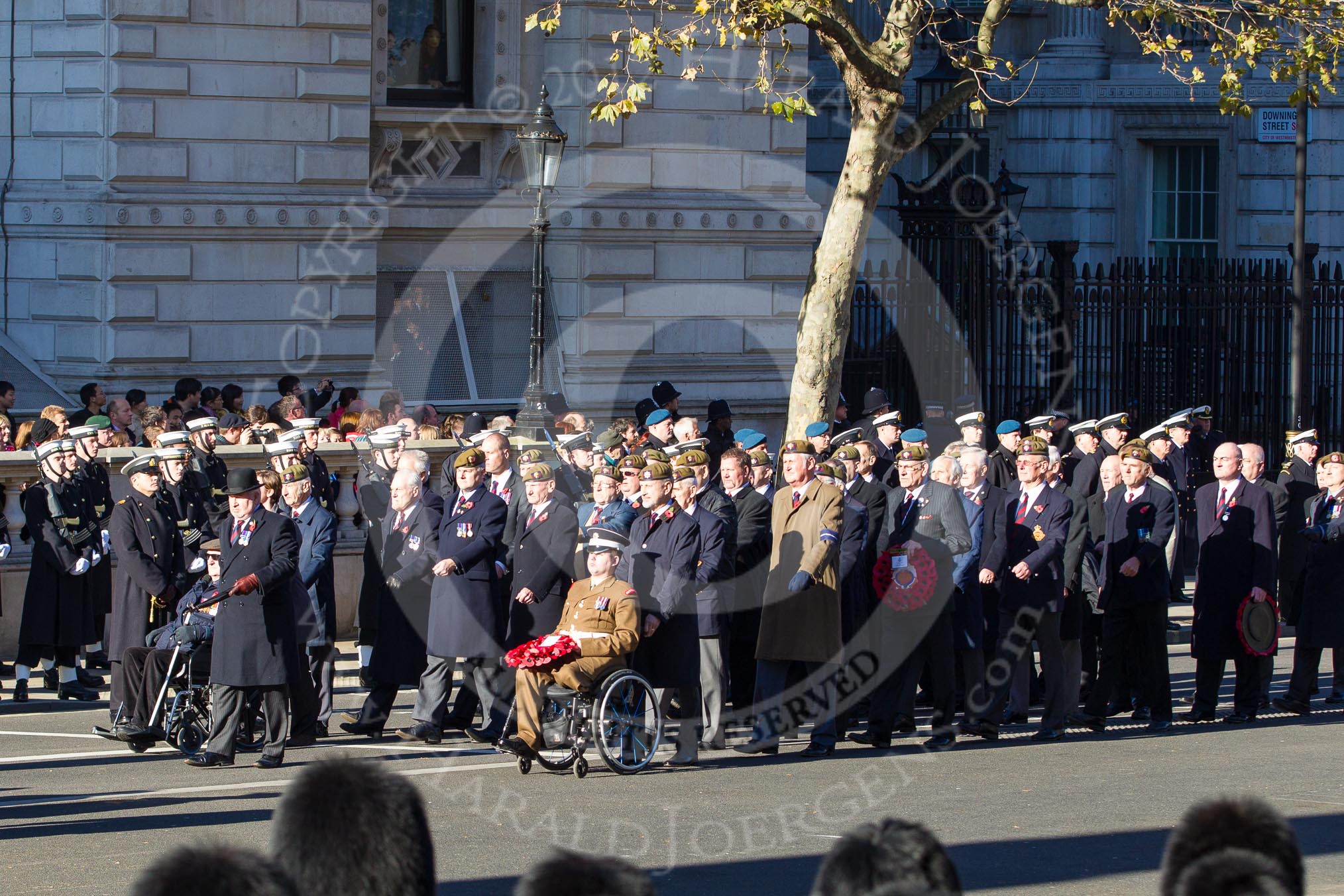 Remembrance Sunday 2012 Cenotaph March Past: Group A25 - Argyll & Sutherland Highlanders Regimental Association and A26 - Grenadier Guards Association..
Whitehall, Cenotaph,
London SW1,

United Kingdom,
on 11 November 2012 at 11:52, image #739