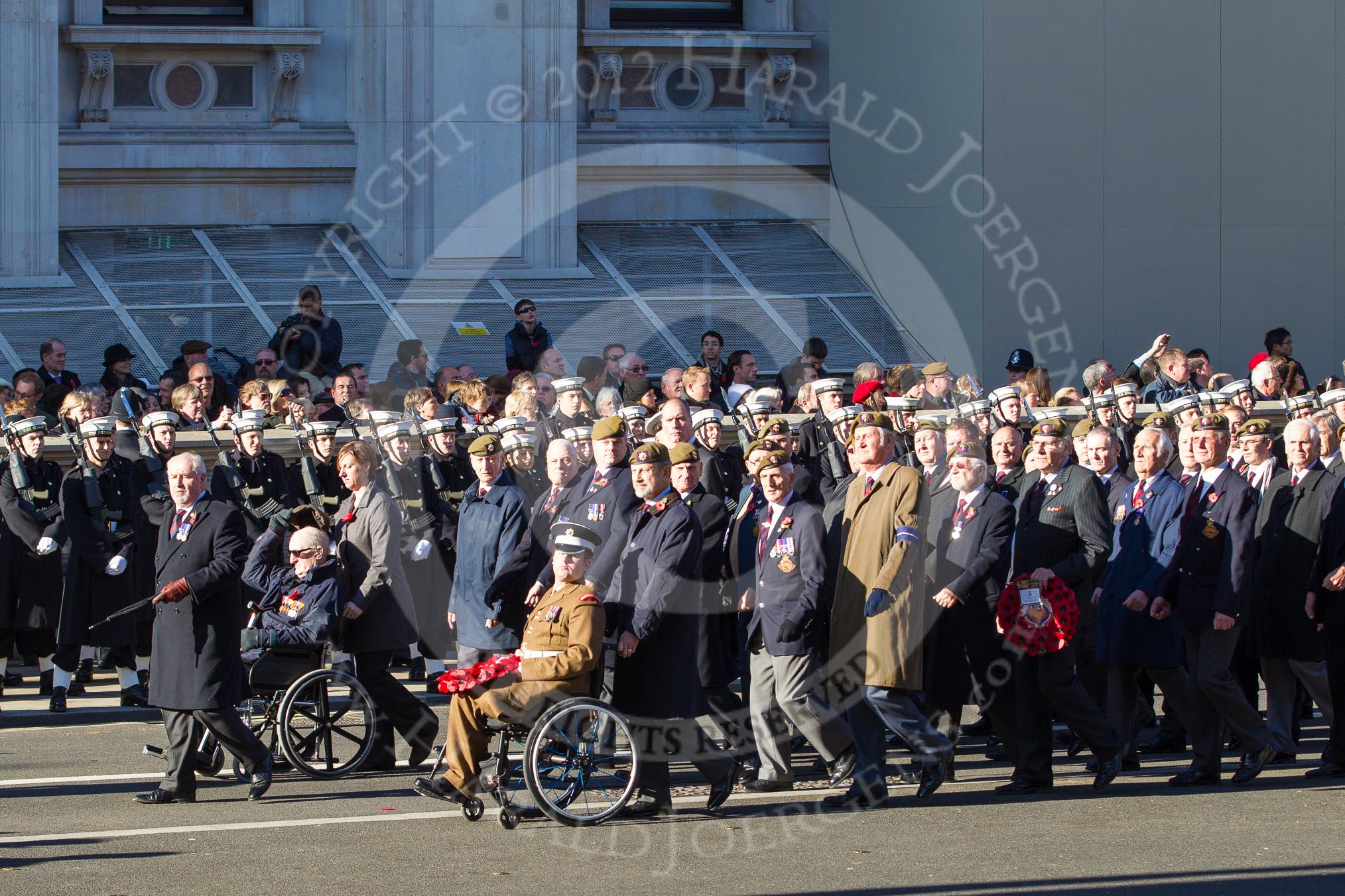 Remembrance Sunday 2012 Cenotaph March Past: Group A25 - Argyll & Sutherland Highlanders Regimental Association and A26 - Grenadier Guards Association..
Whitehall, Cenotaph,
London SW1,

United Kingdom,
on 11 November 2012 at 11:52, image #746